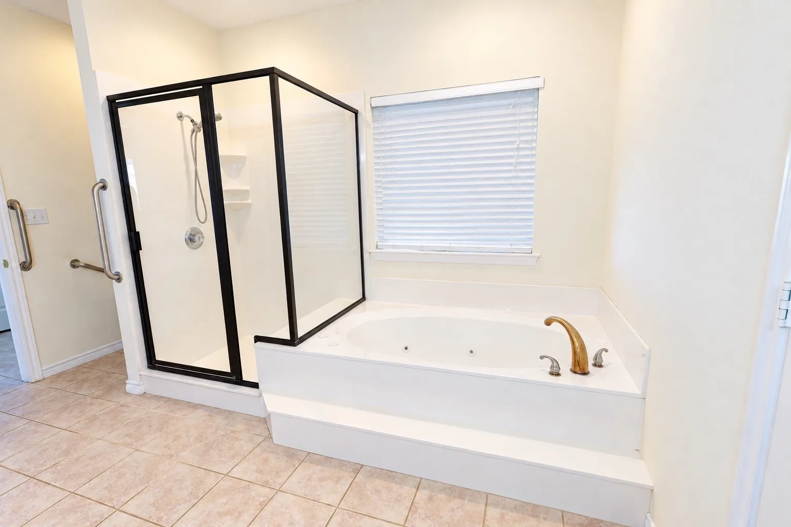 Separate shower and jetted tub in primary bath