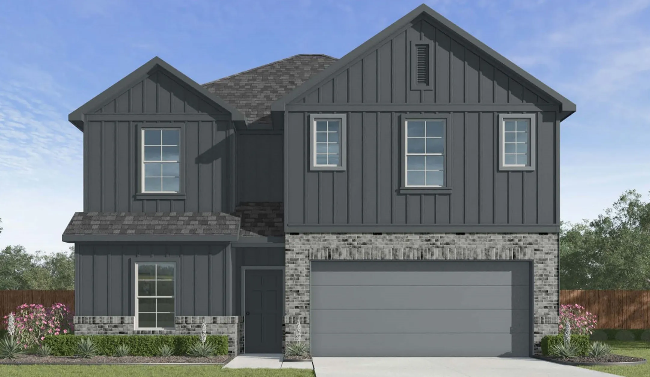 Two-story exterior featuring a board and batten facade and stone accents