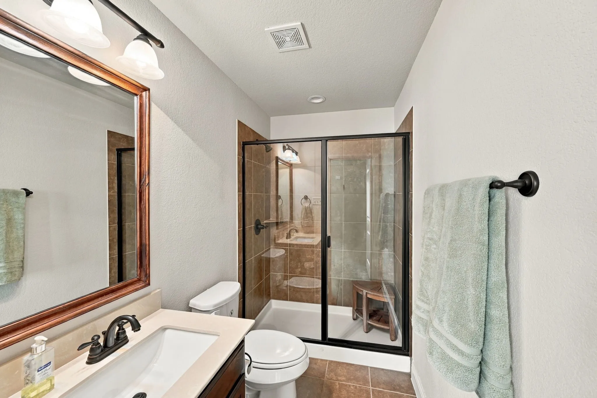 Upstairs full bath with walk-in shower.