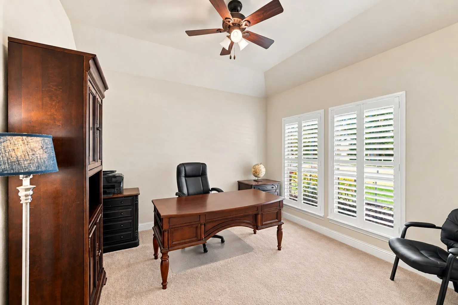 This is the front bedroom being used as an office. Tons of natural light, a closet, and barn door entrance.