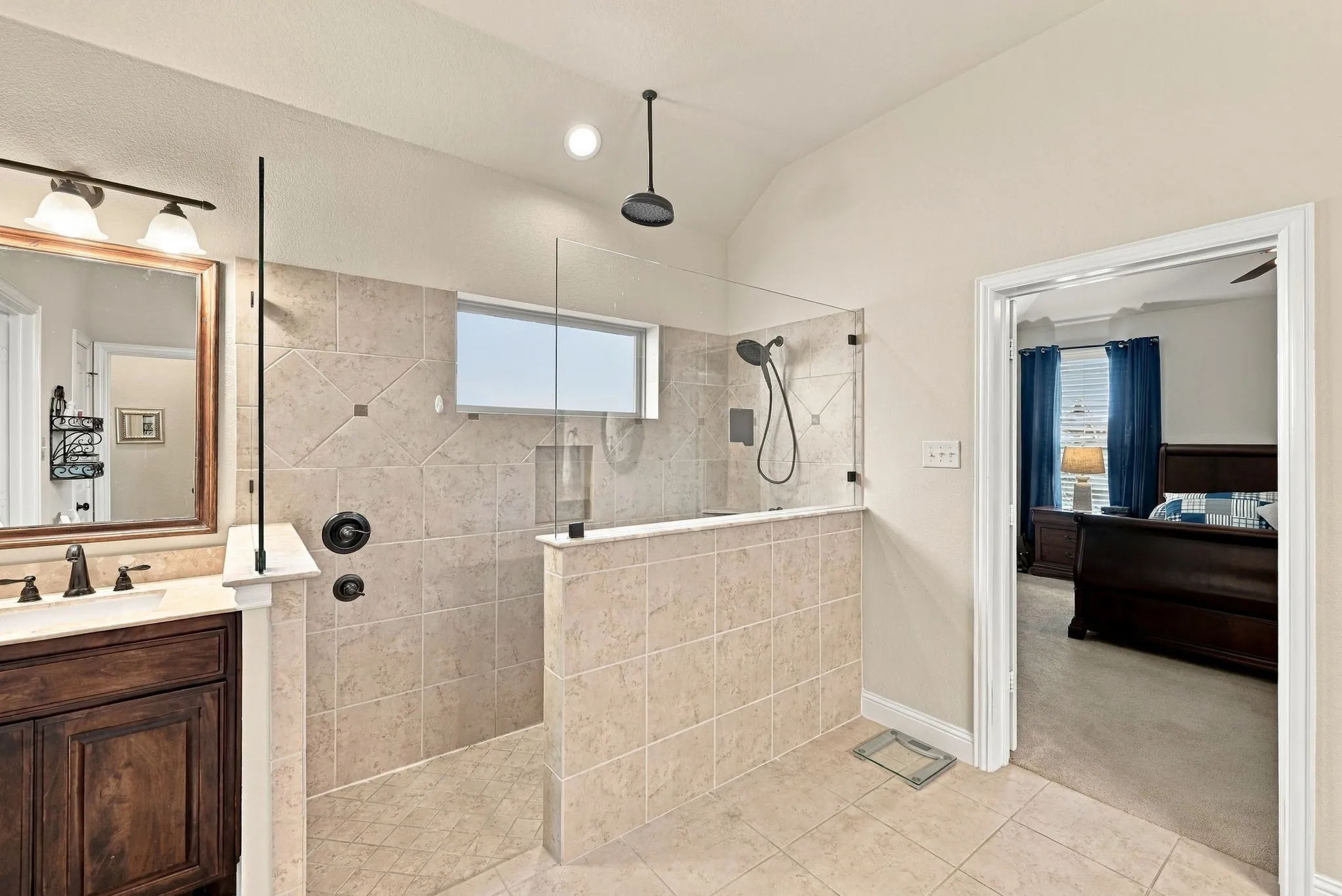 Primary bathroom featuring the 2nd sink area and huge walk-in shower.