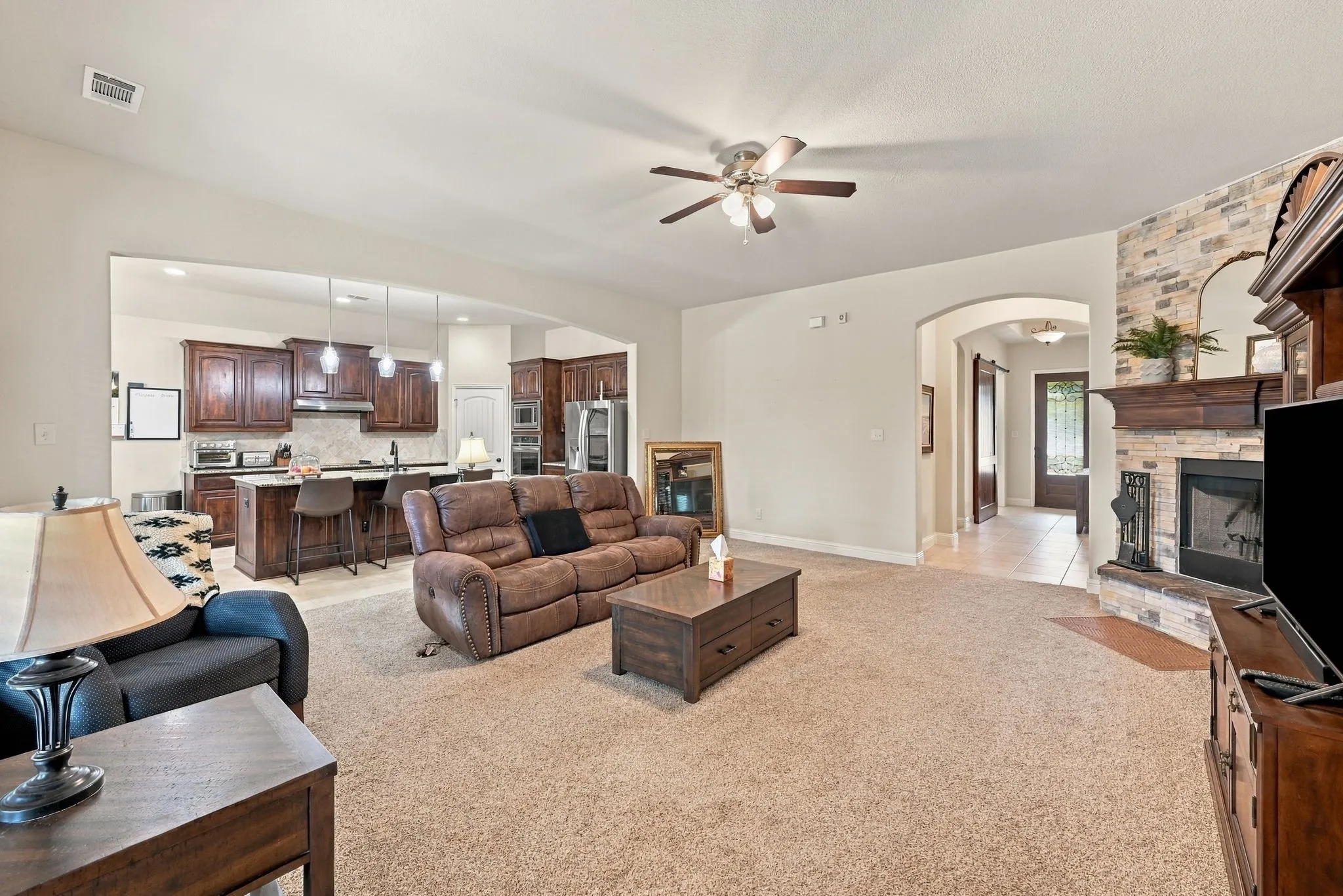 Large and open-concept living area facing the gorgeous kitchen. Plenty of room for entertaining!