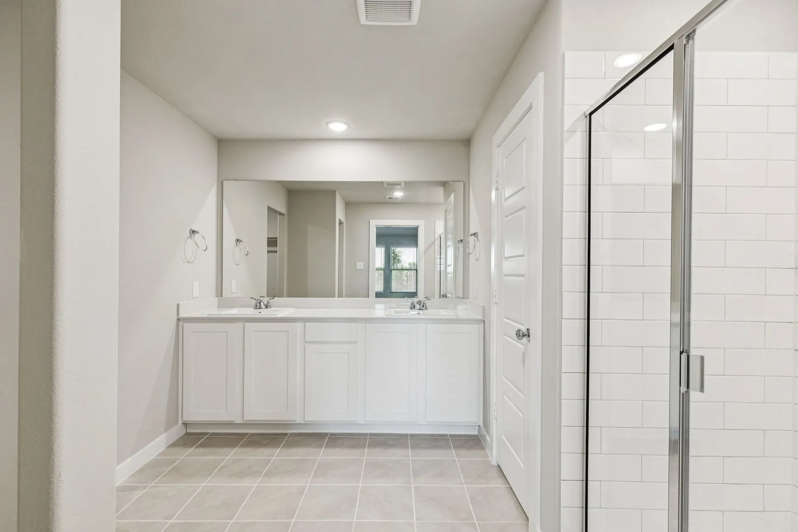 Primary Bathroom in the Harper home plan – REPRESENTATIVE PHOTO