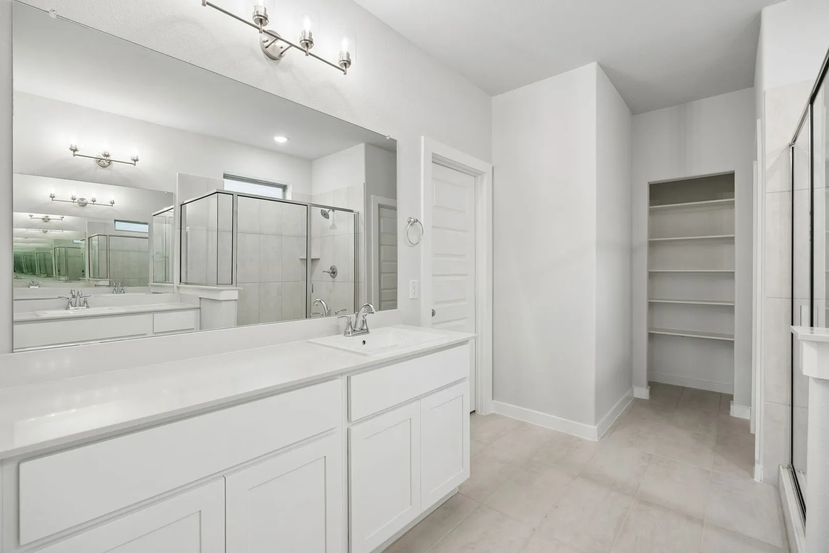 Primary Bathroom in the Winters home plan – REPRESENTATIVE PHOTO