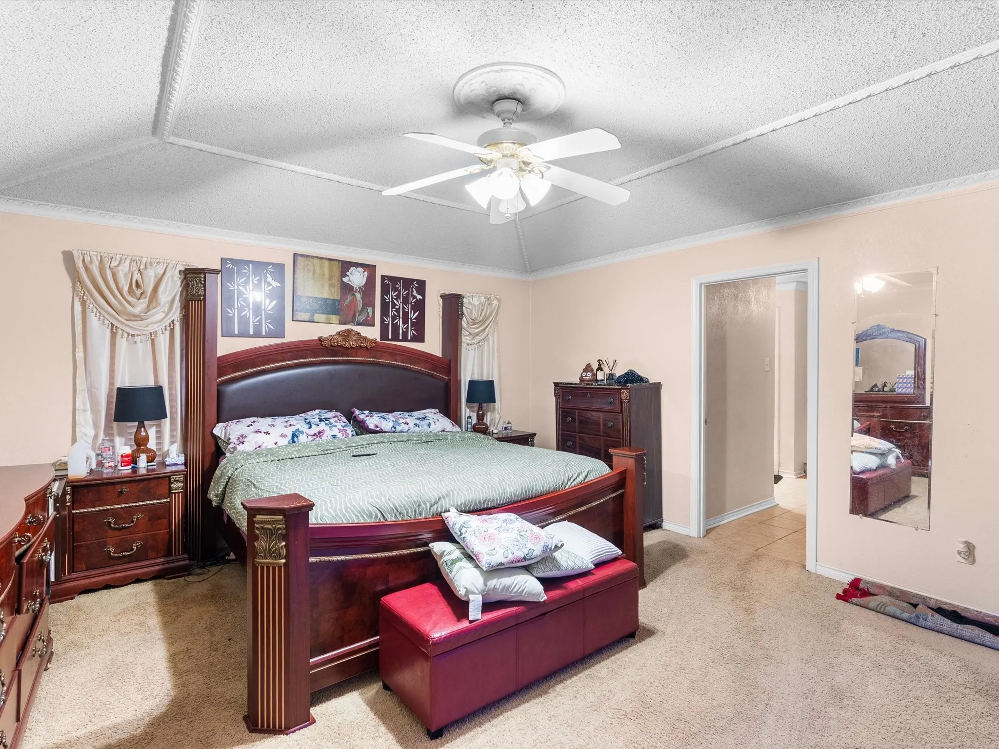 Primary bedroom with decorative trim