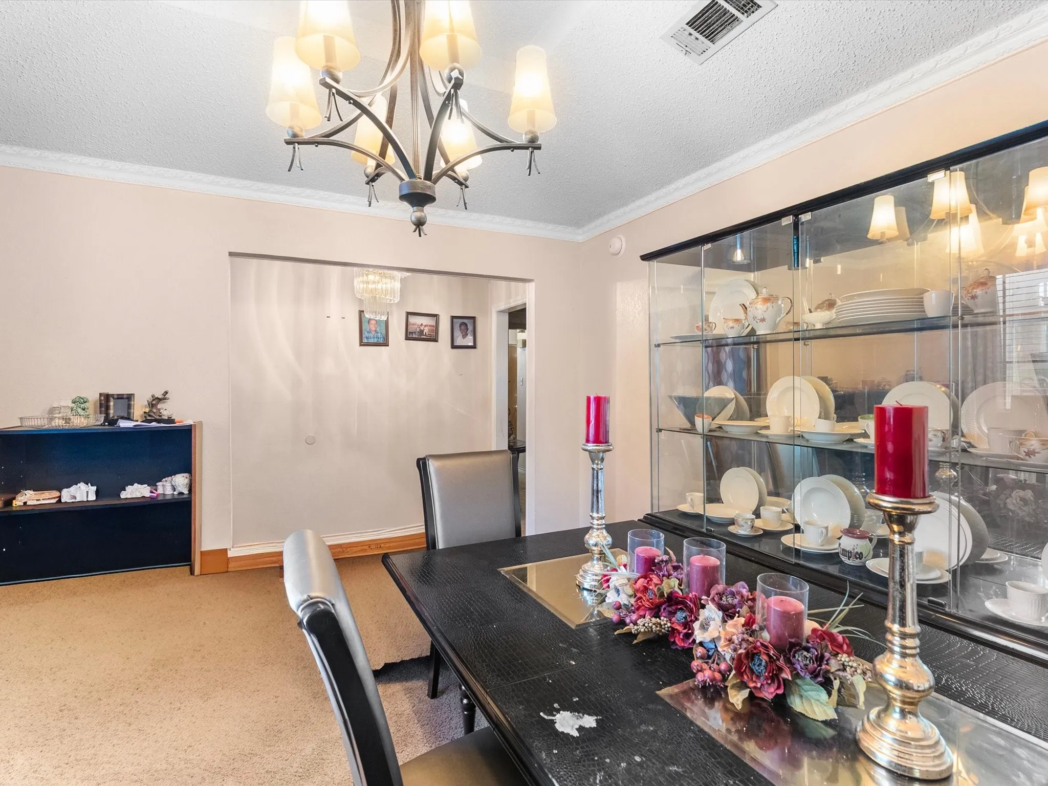 Ornate chandelier, decorative crown molding