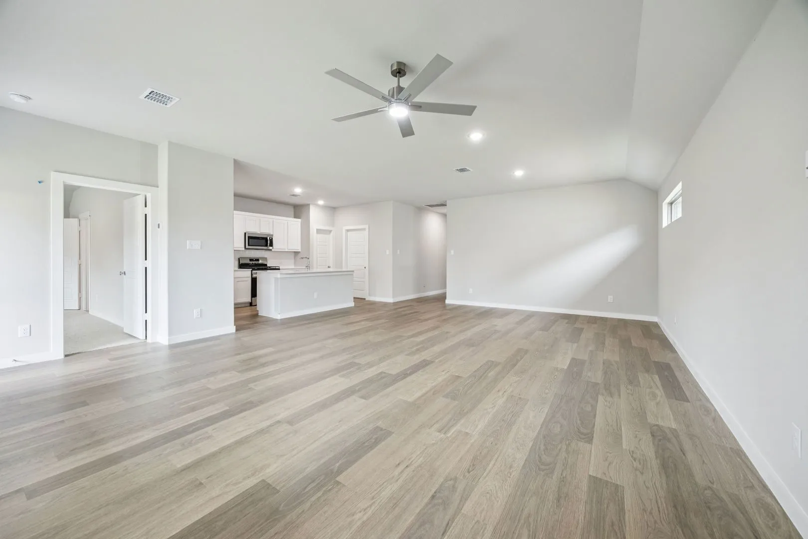 Dining and Living Room in the Hayden home plan – REPRESENTATIVE PHOTO