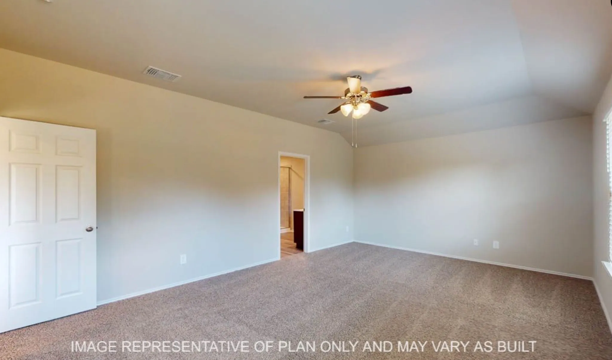 Carpeted flooring, vaulted ceiling, ceiling fan with integrated lighting, paneled interior door, and window
