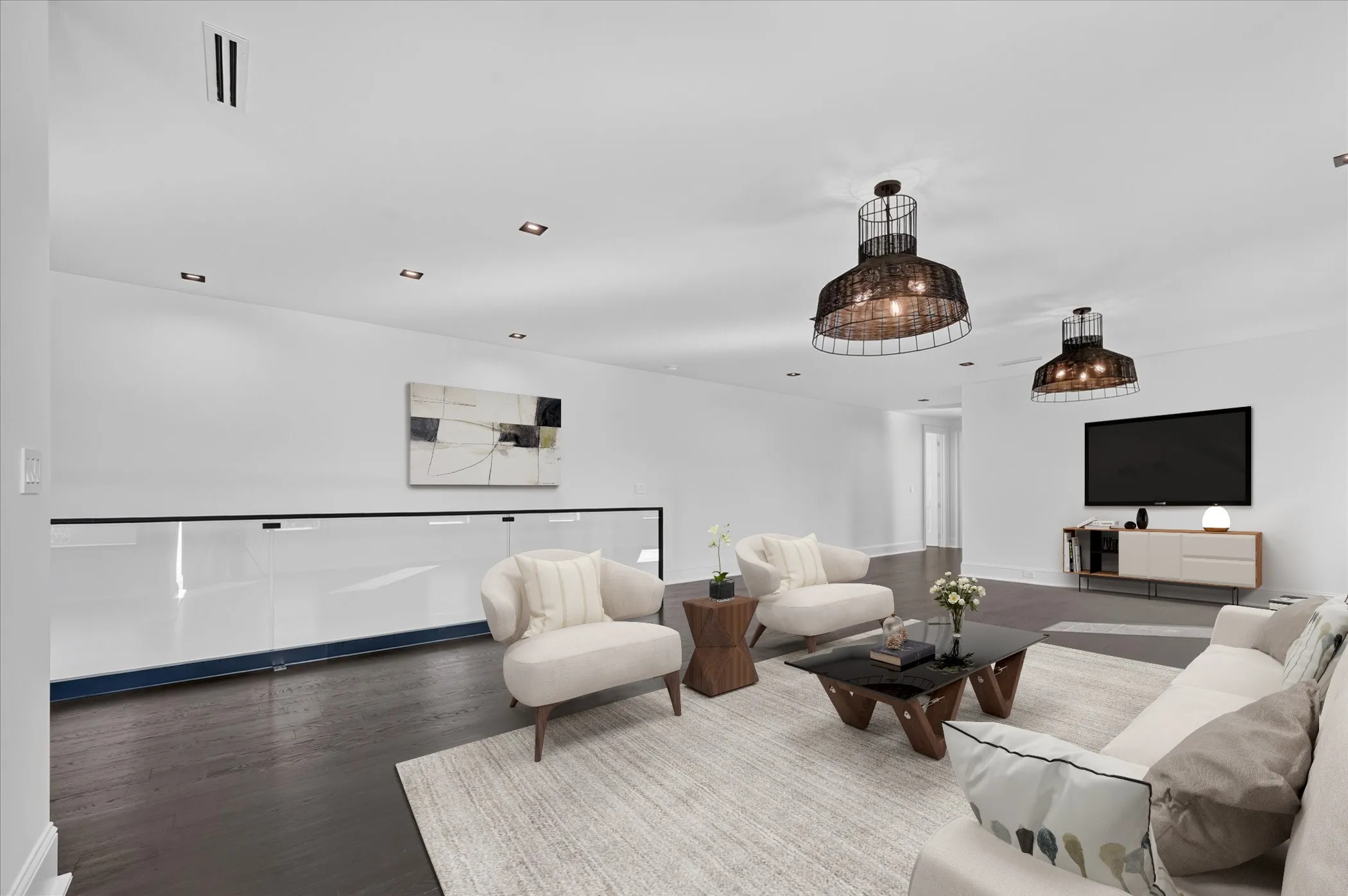 Dark wood-finish flooring, recessed ceiling lighting, and two wire-frame pendant lights