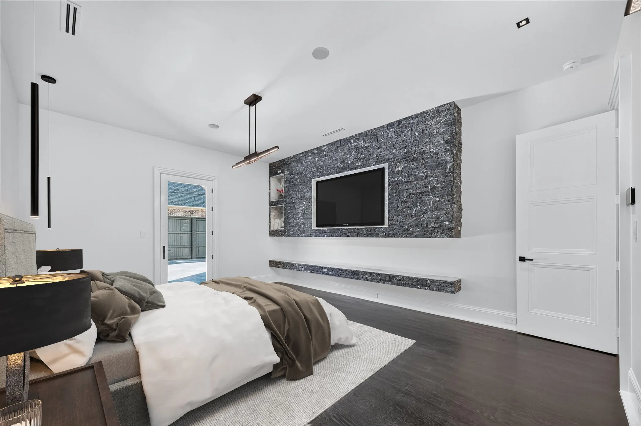 Accent wall featuring stacked stone and integrated shelving