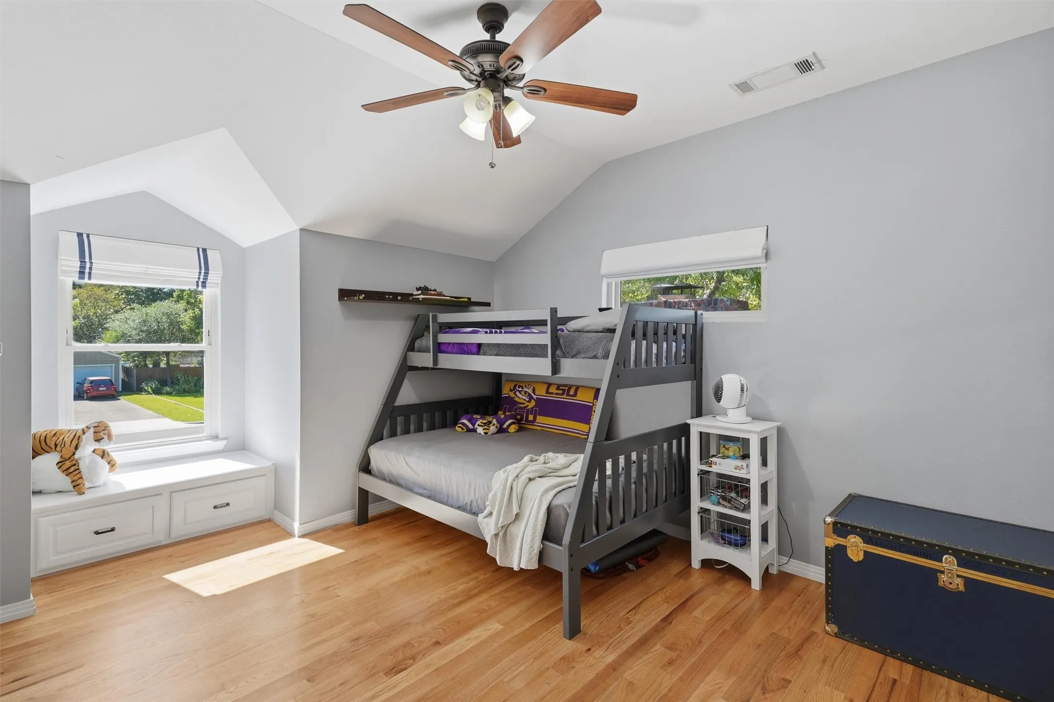 Second upstairs bedroom with dual walk in closets, and reading nook.