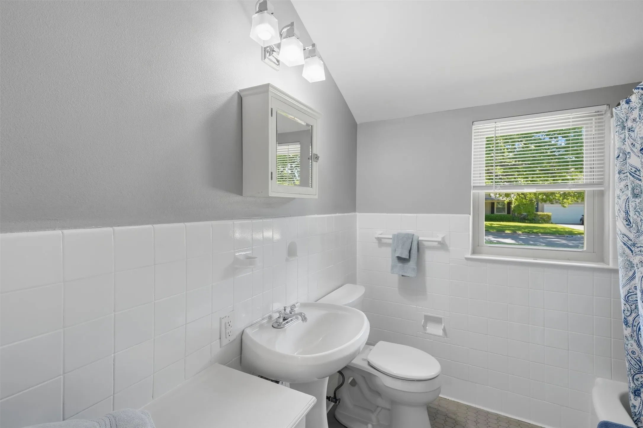 Full bath downstairs positioned perfect for guest use.
