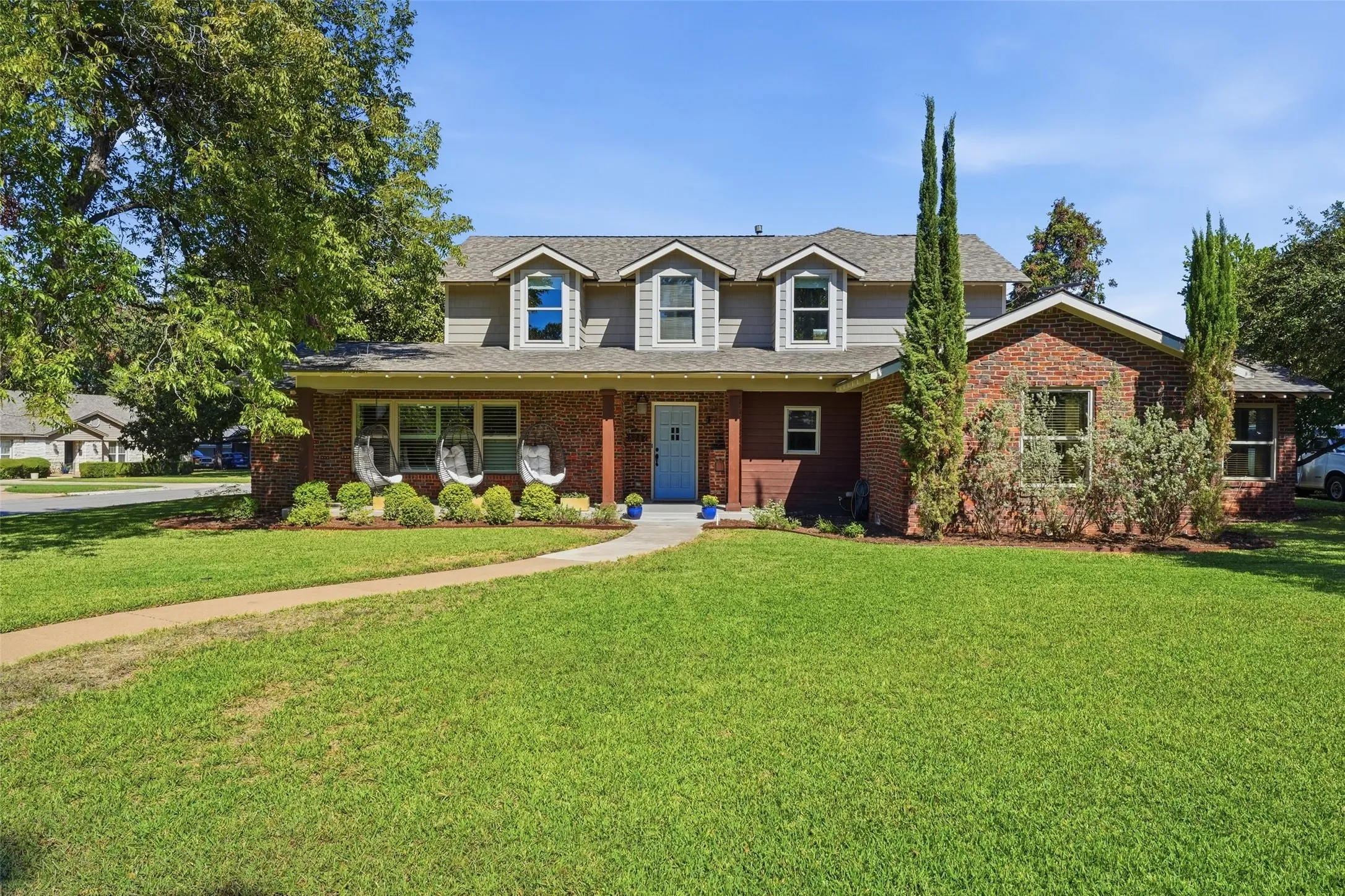 Welcome to 3712 Brighton - with classic brick exterior with charming dormer windows, excellent curb appeal, and manicured lawn!
