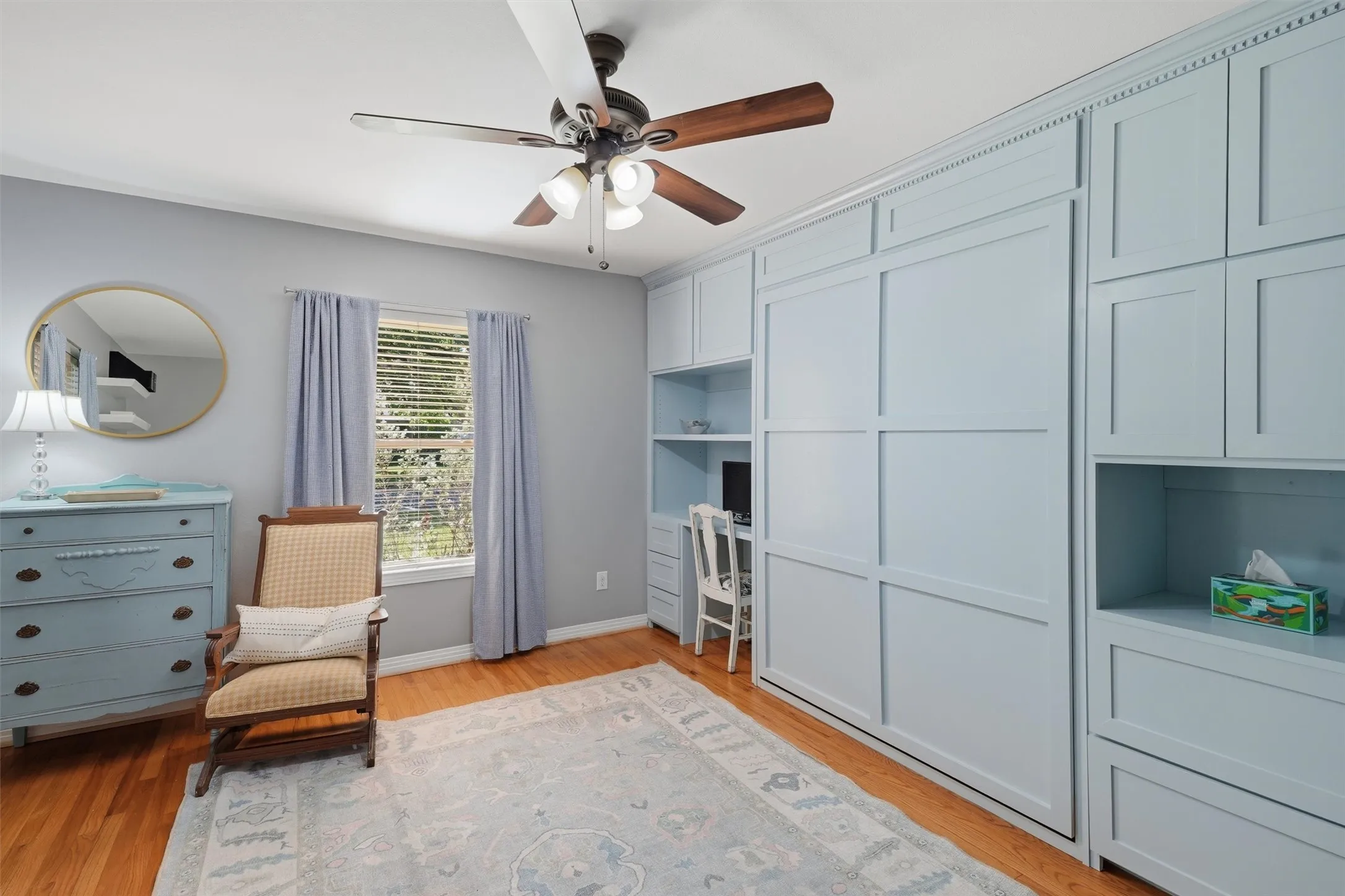 Whether working or needing to host guest for extended stay, this murhphy bed and office provides the perfect blend.