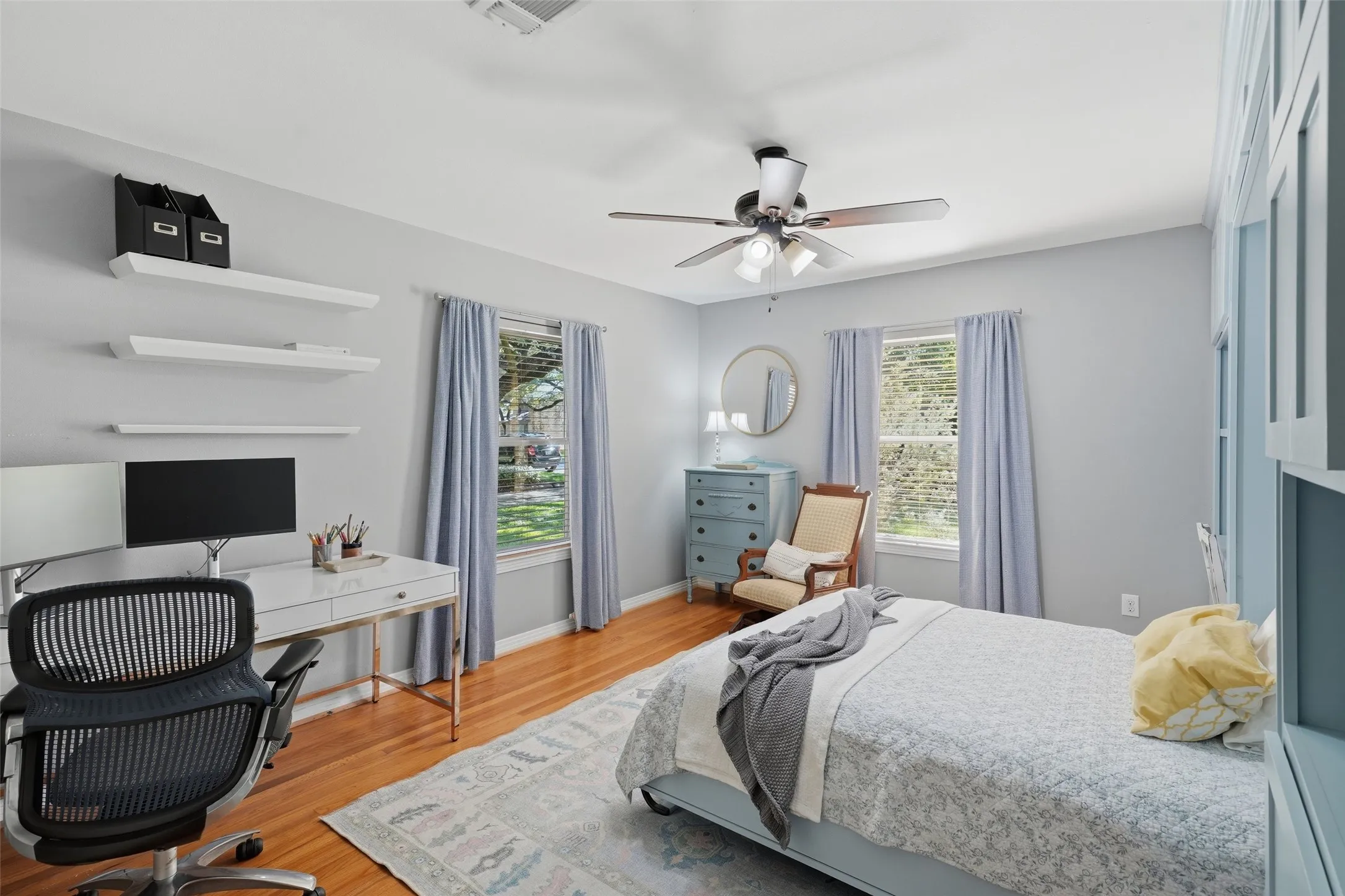 Versatile downstairs bedroom/flex space with a built in Murphy bed and tons of cabinets