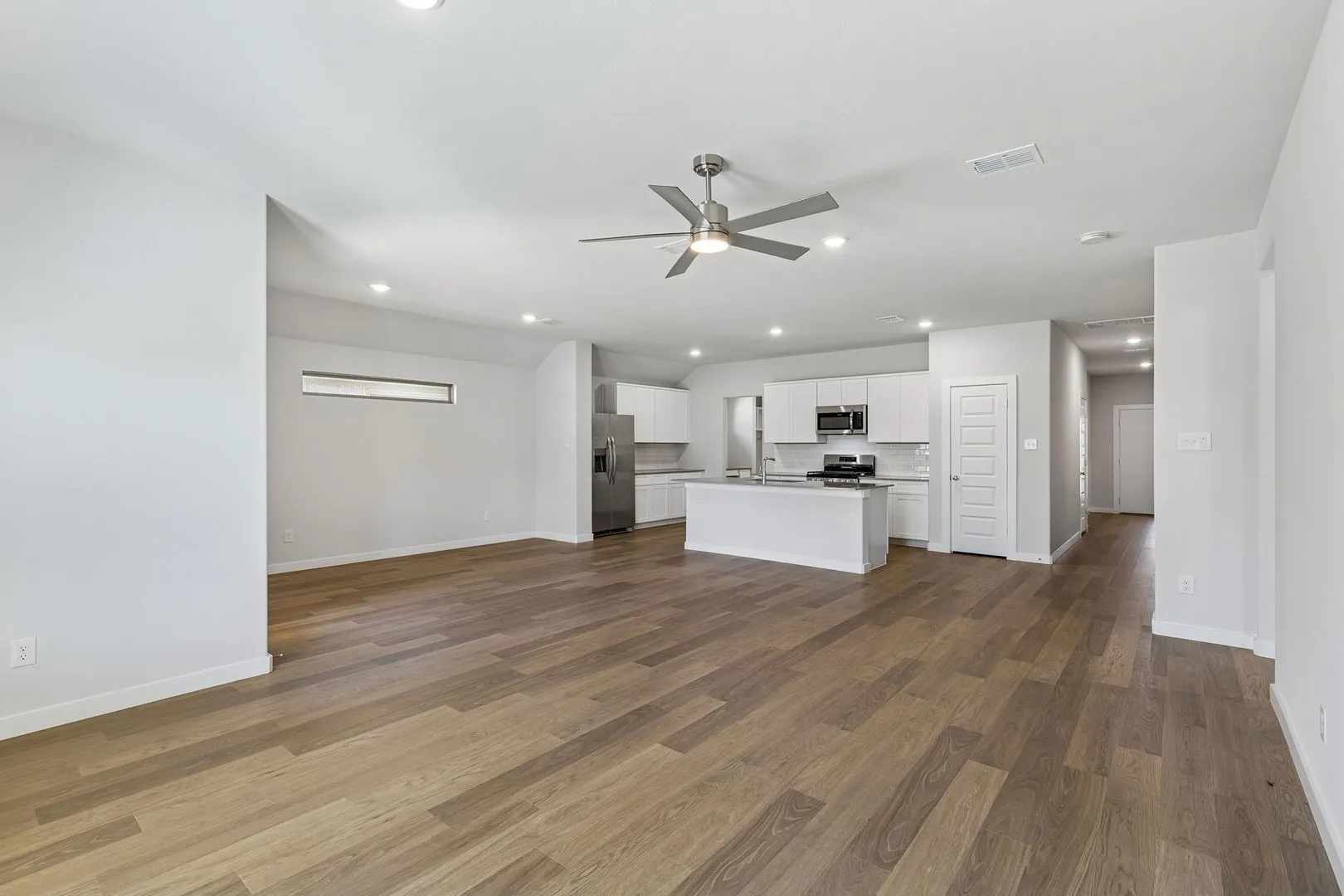 Open Floor Plan in the Harrison home plan – REPRESENTATIVE PHOTO