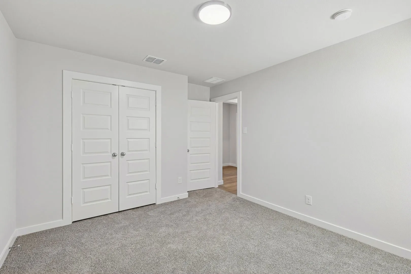 Bedroom in the Harrison home plan – REPRESENTATIVE PHOTO
