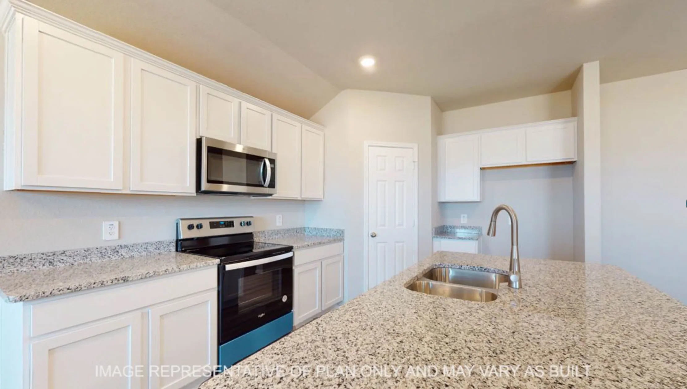 Spacious kitchen featuring white cabinetry, stainless steel appliances, granite countertops, and a dual-basin sink with a gooseneck faucet