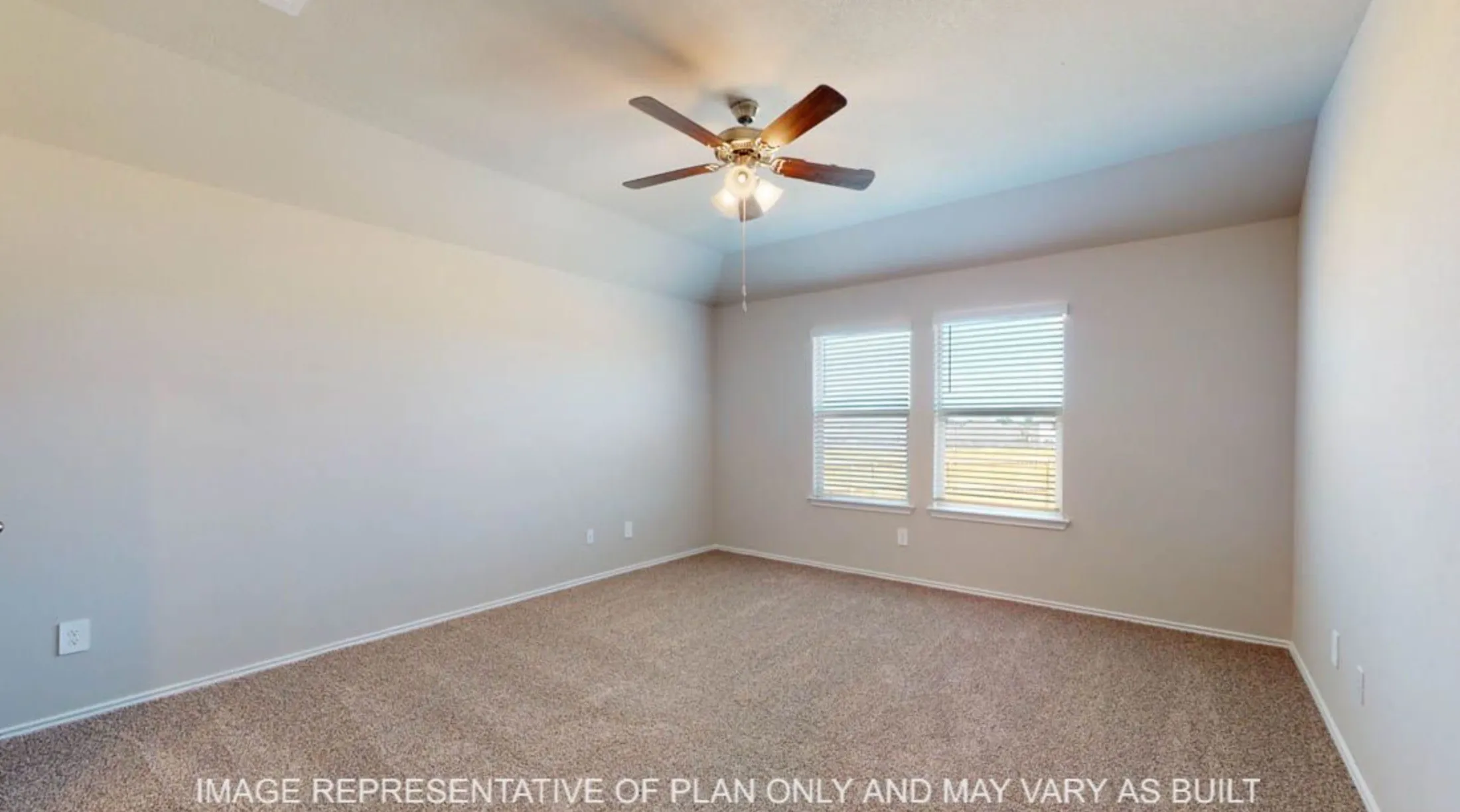 Carpeted flooring with light-toned walls, featuring a ceiling fan with integrated lighting