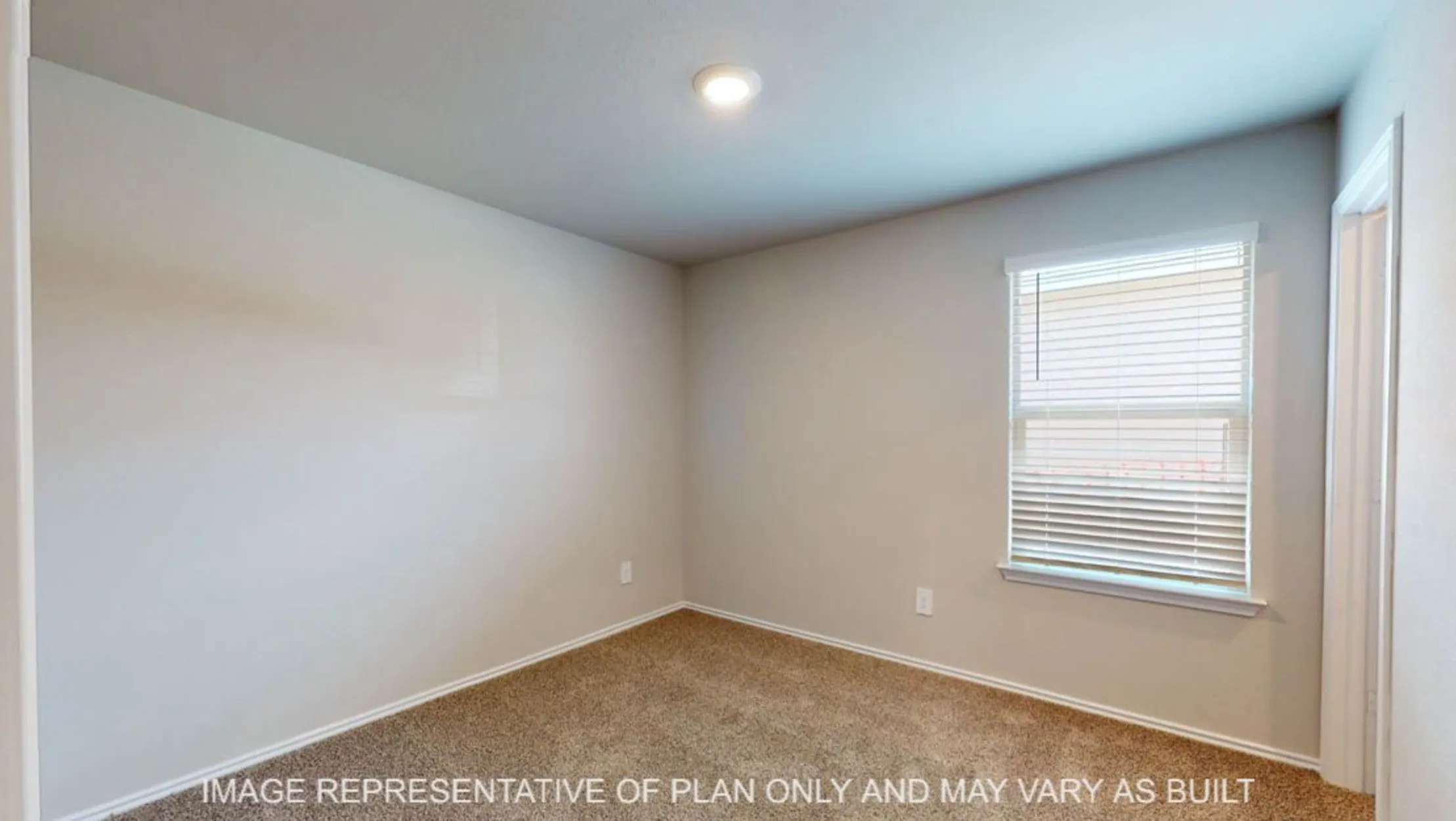 Wall-to-wall carpeting, recessed ceiling lighting, and window blinds