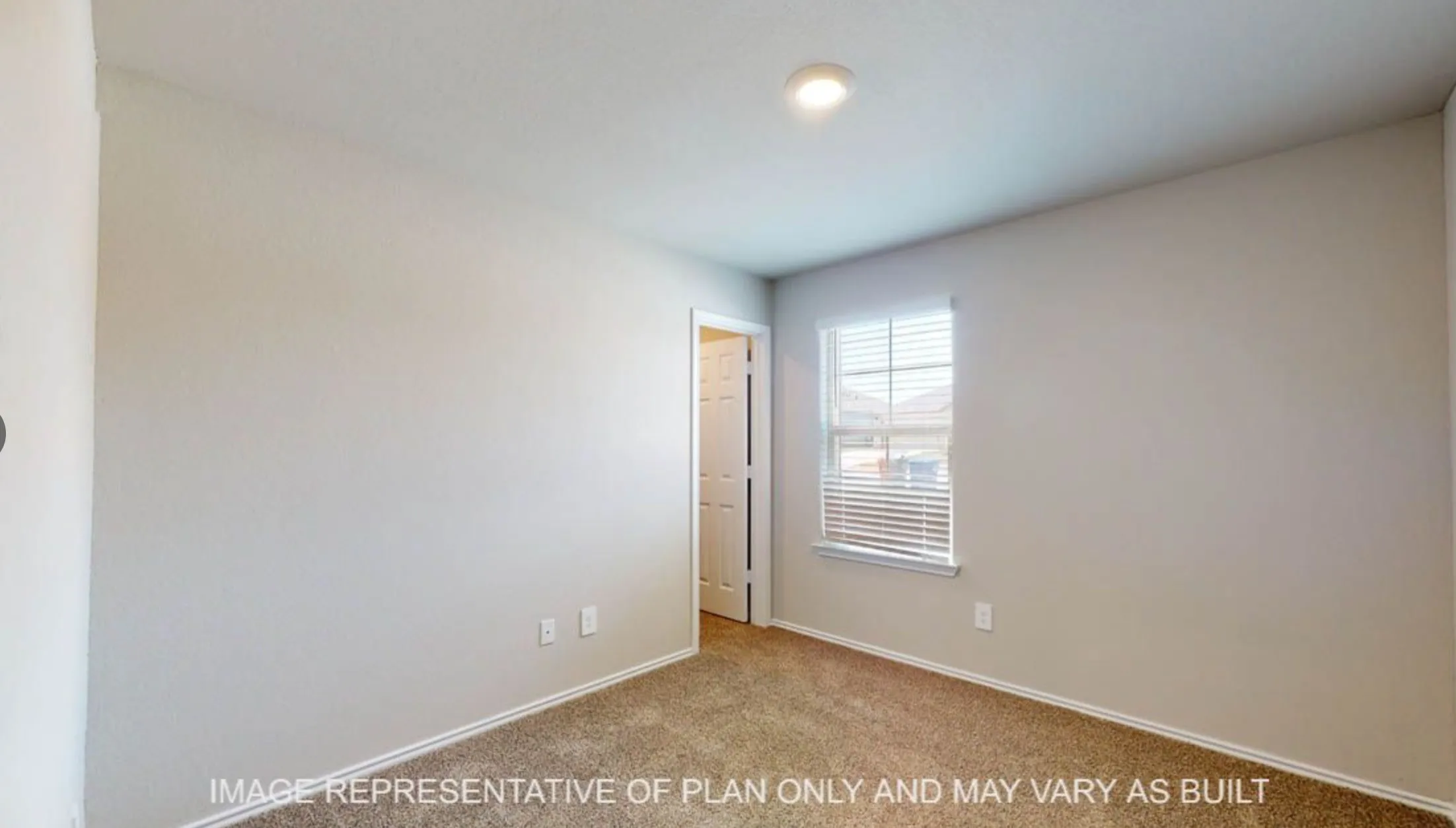 Carpeted flooring, recessed ceiling lighting, light-toned wall paint, and a window with blinds