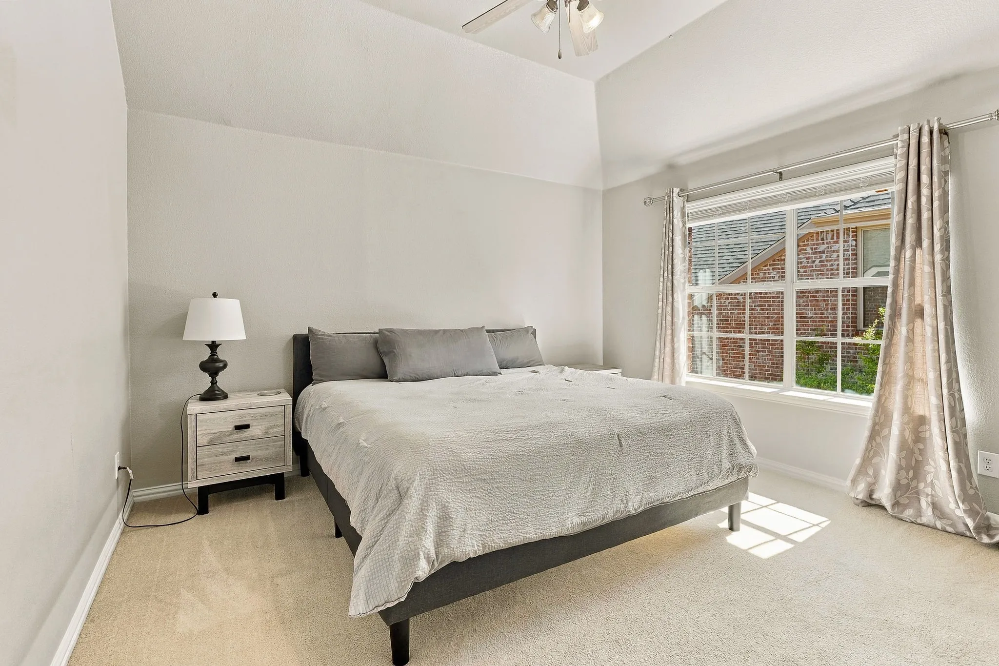 Upstairs Secondary Bedroom, Additional Room | Carpeted bedroom with a ceiling fan and a large window overlooking the surrounding trees.