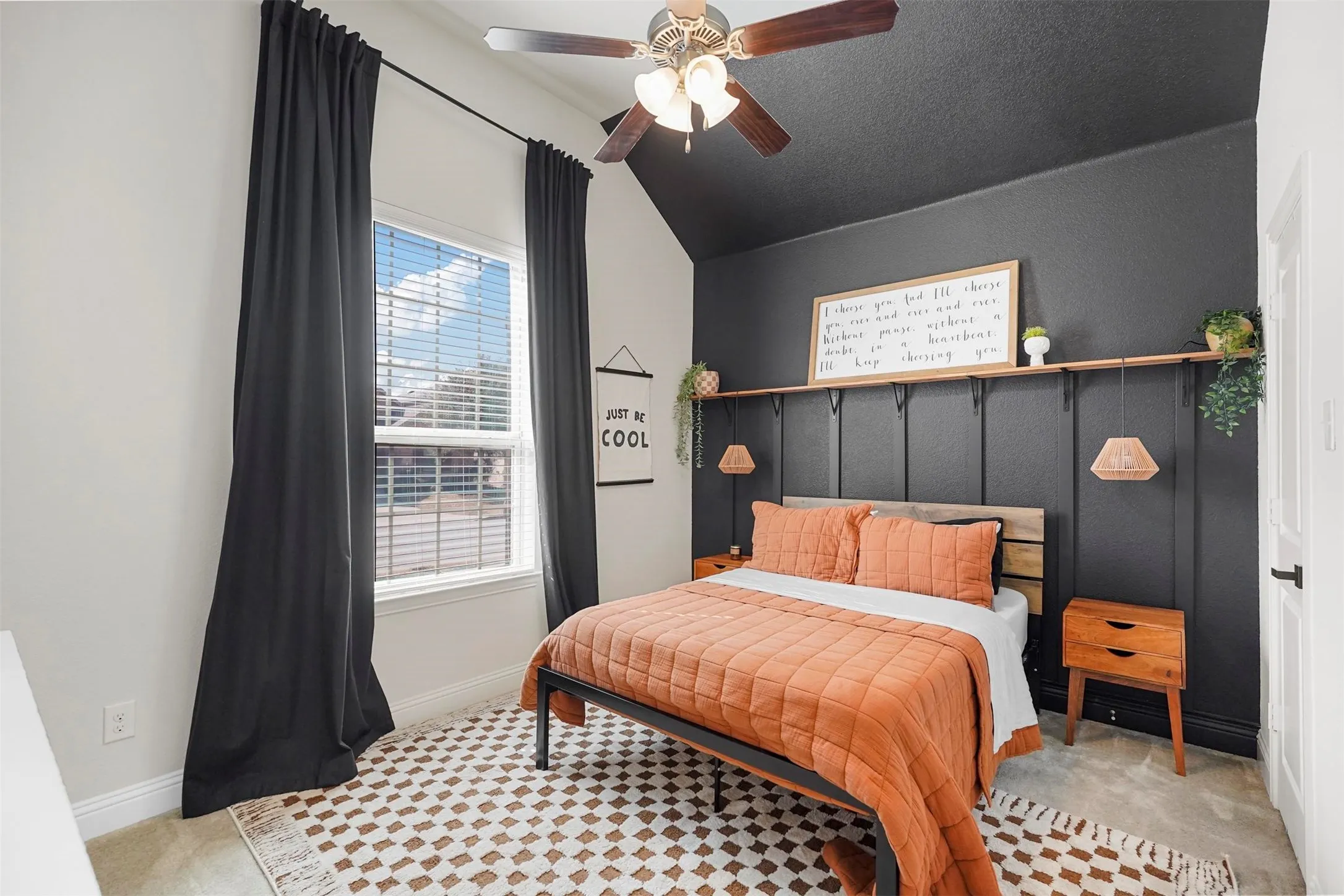 Accent wall with vertical paneling and an integrated wood-finish shelf