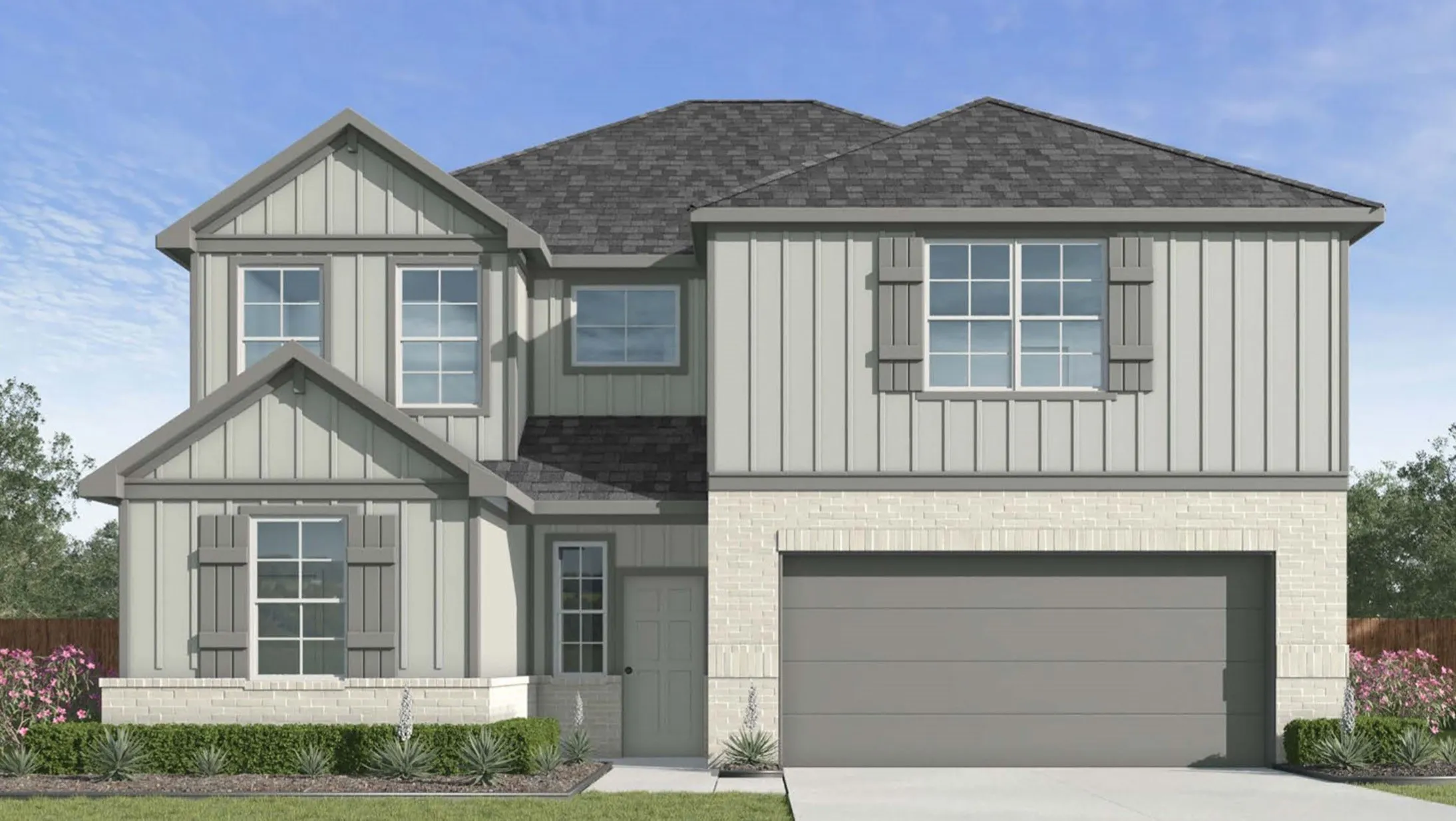 Two-story residence featuring a combination of light-colored brick and vertical siding, a dark shingle roof, and a two-car garage