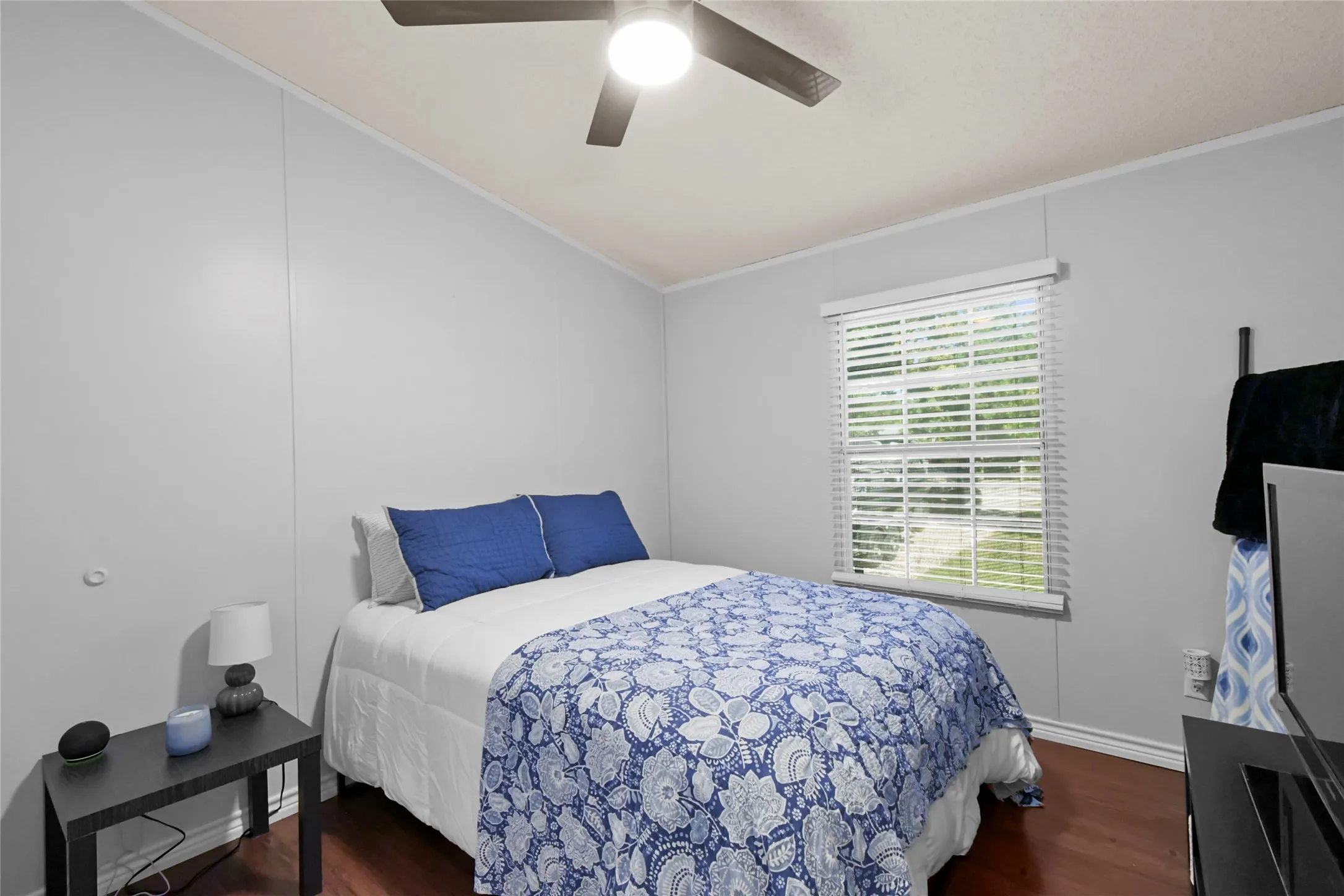 Wood-finish flooring with a light grey wall finish