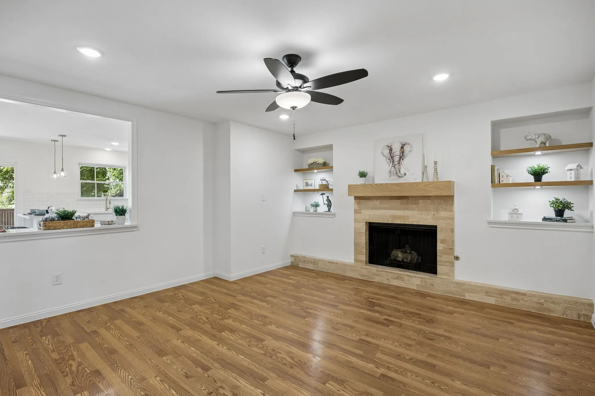 Open and bright living space with a beautiful view of the very private back yard
