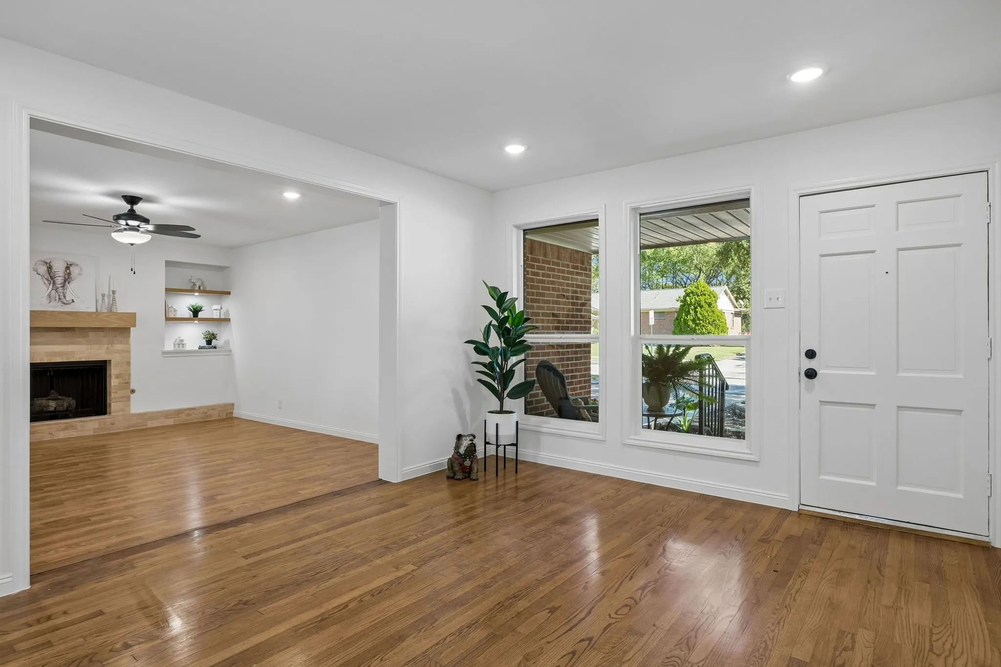 Accented with fresh paint, new windows, refreshed flooring, new lighting and a redesigned fireplace, there is so much room to spread out and enjoy this open floor plan