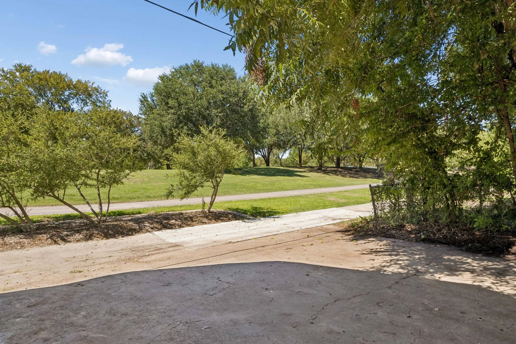Location location location! Doesn't get better than this.  Walking trails, playground, pools, tennis and pickleball court and let's not forget the annual Cottonwood Arts festival... all within walking distance.  The privacy this home offers is unmatched with no neighbors behind.  It Feels like living in the country yet you are just a short drive to city center.