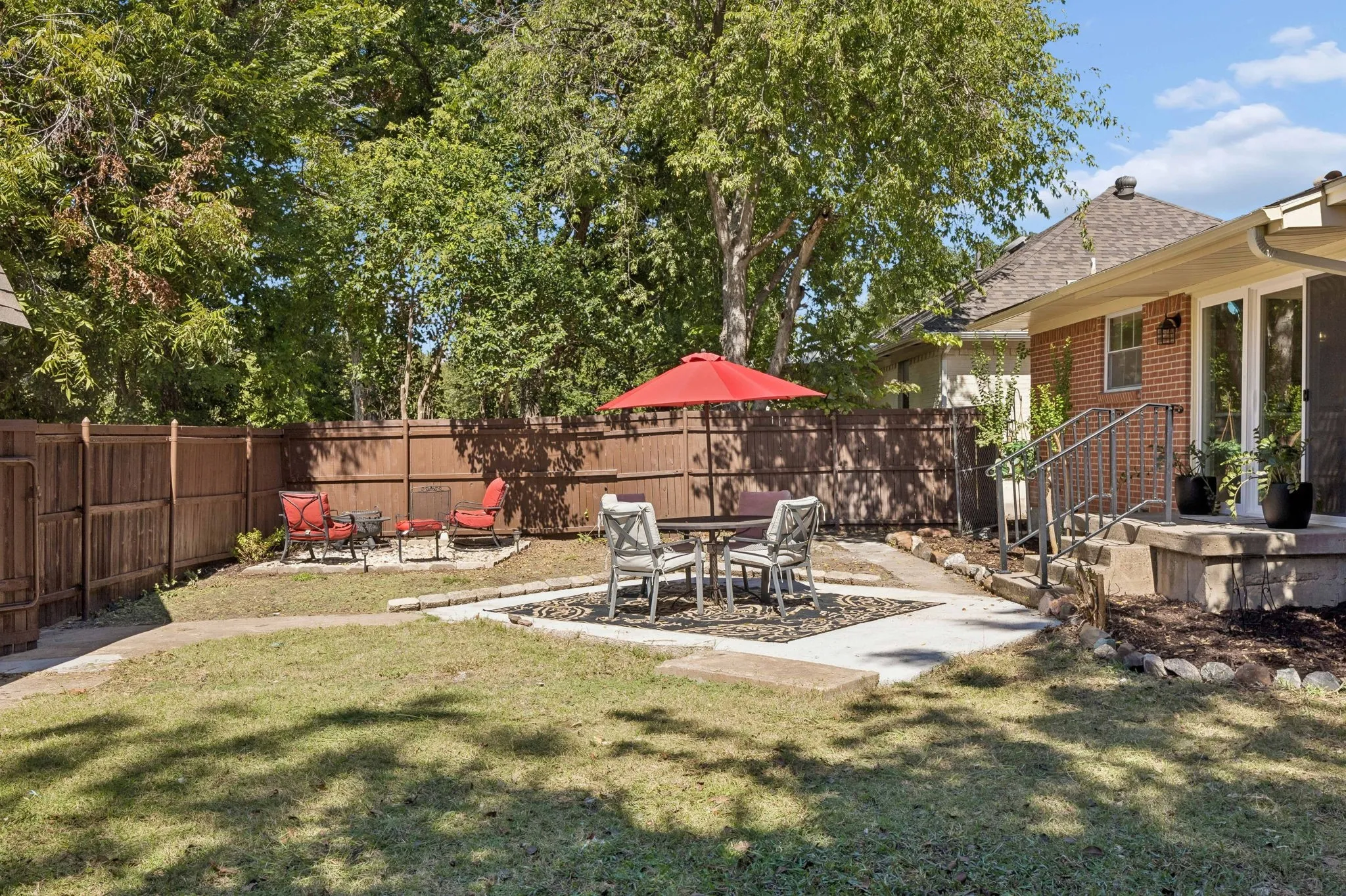 Fire pit and patio.   Small concrete bump is meant for your grill.