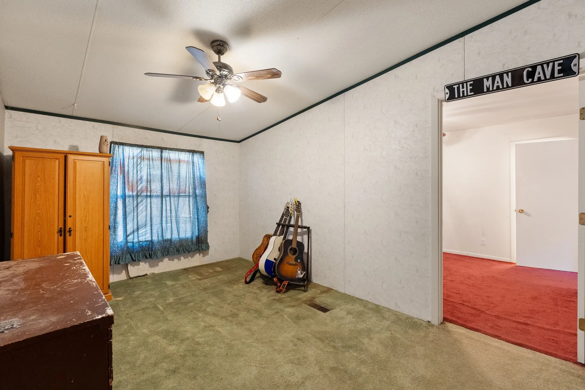 Bedroom #3 with ceiling fan.