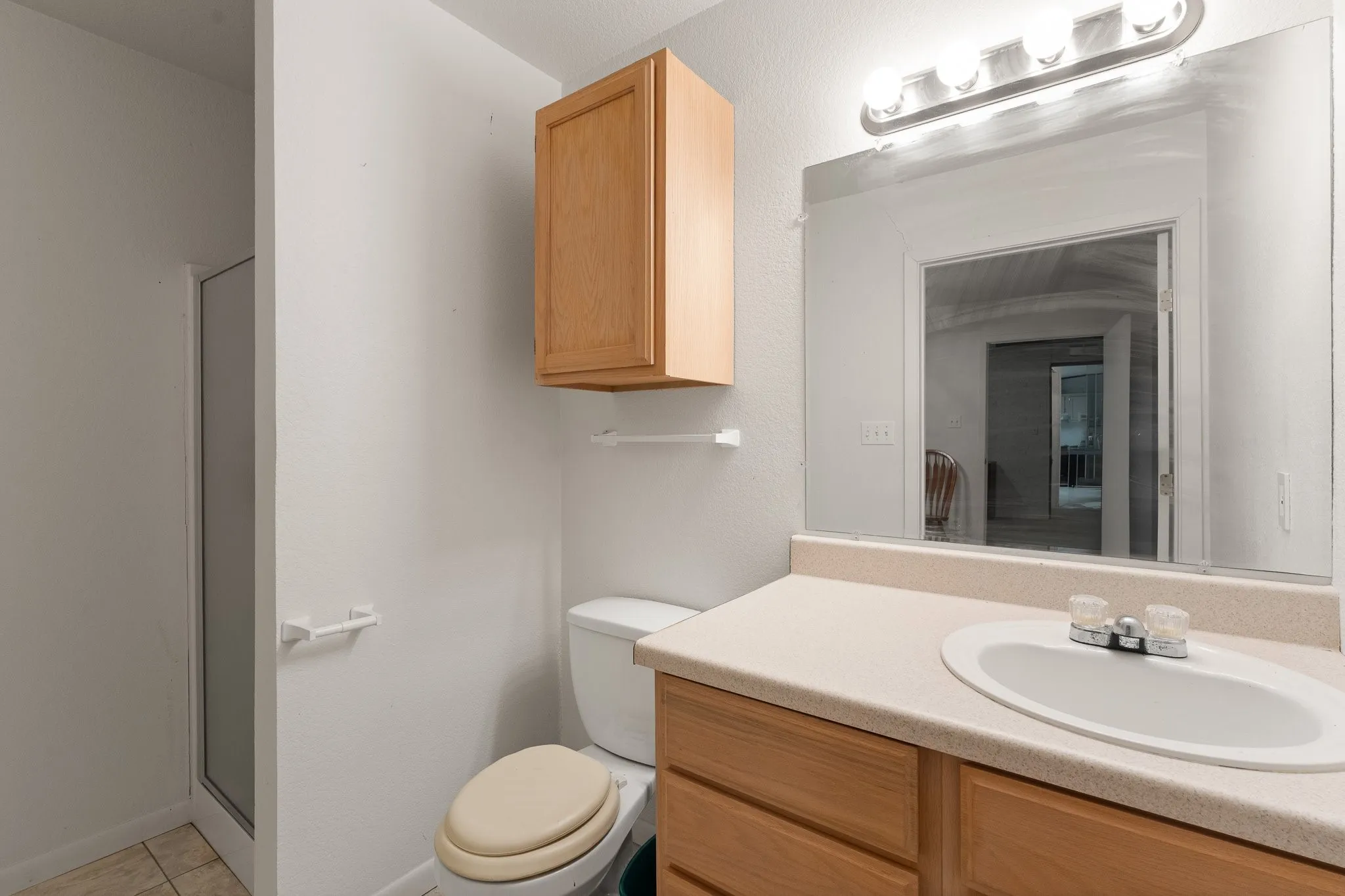 Mother in Law Suite with vanity and walk in shower.