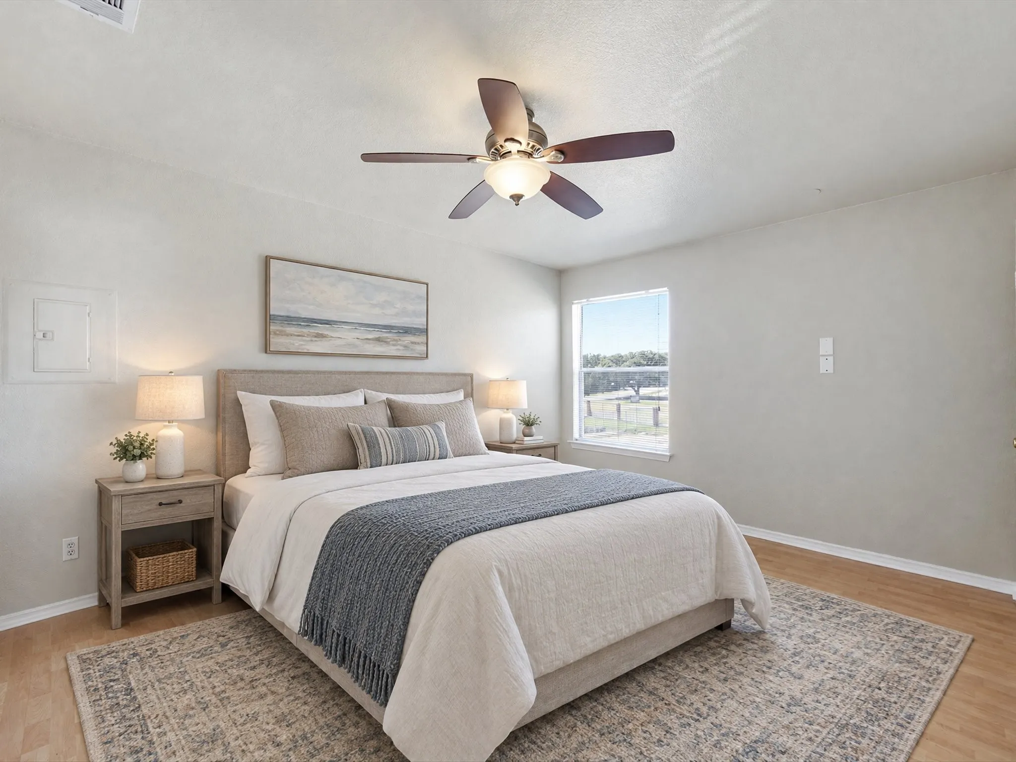 Recessed lighting, ceiling fan with integrated light, wood-finish flooring, and a large window