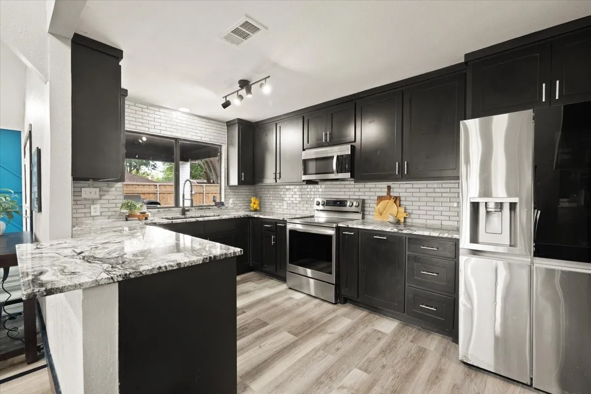 Updated Kitchen with Stainless Steel Appliances