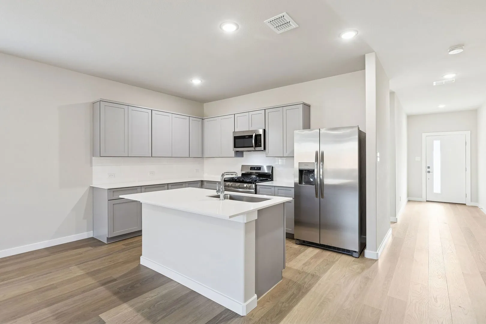 Kitchen in the Haylee home plan - REPRESENTATIVE PHOTO
