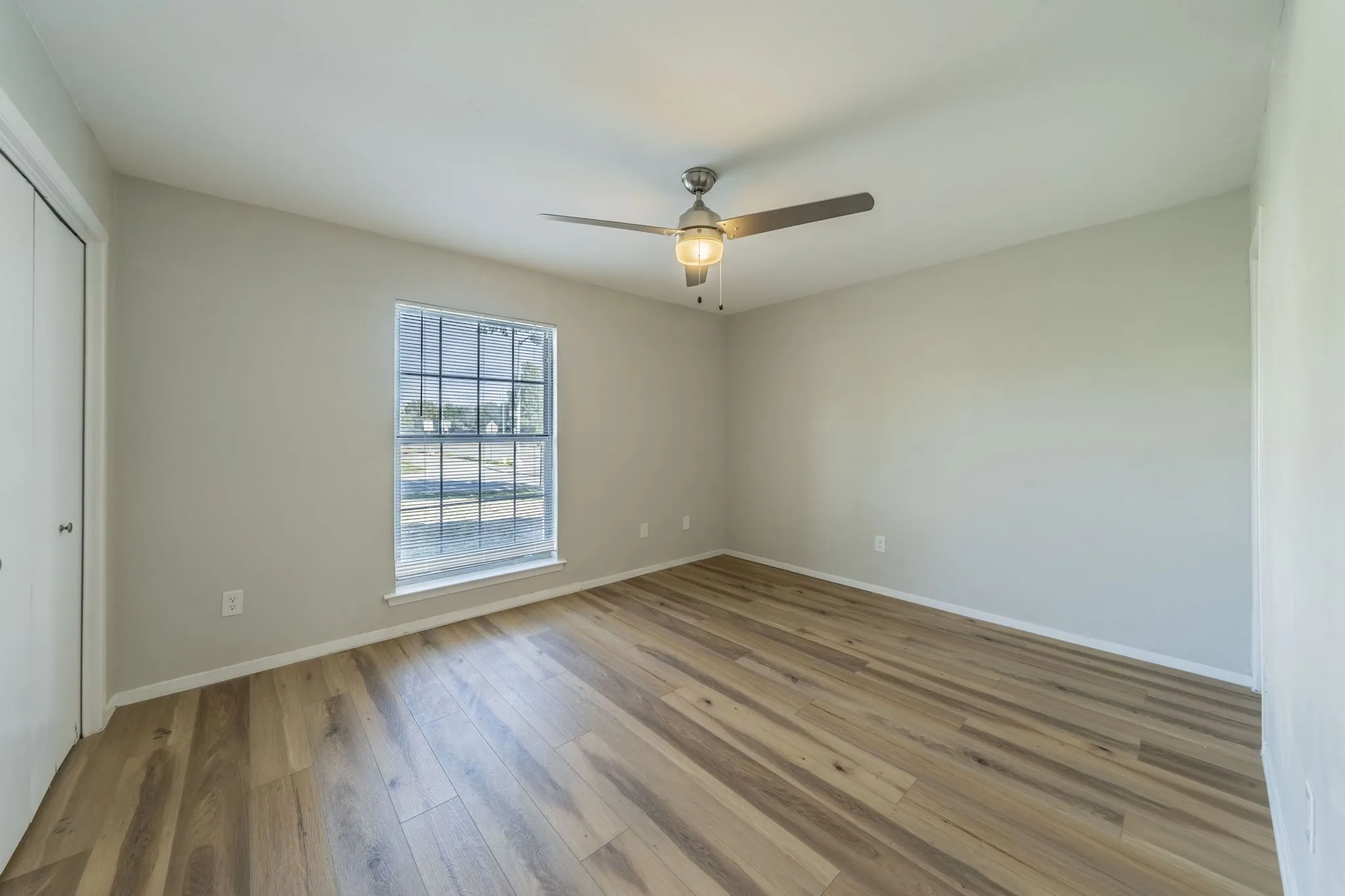 Wood-finish flooring with a neutral wall palette