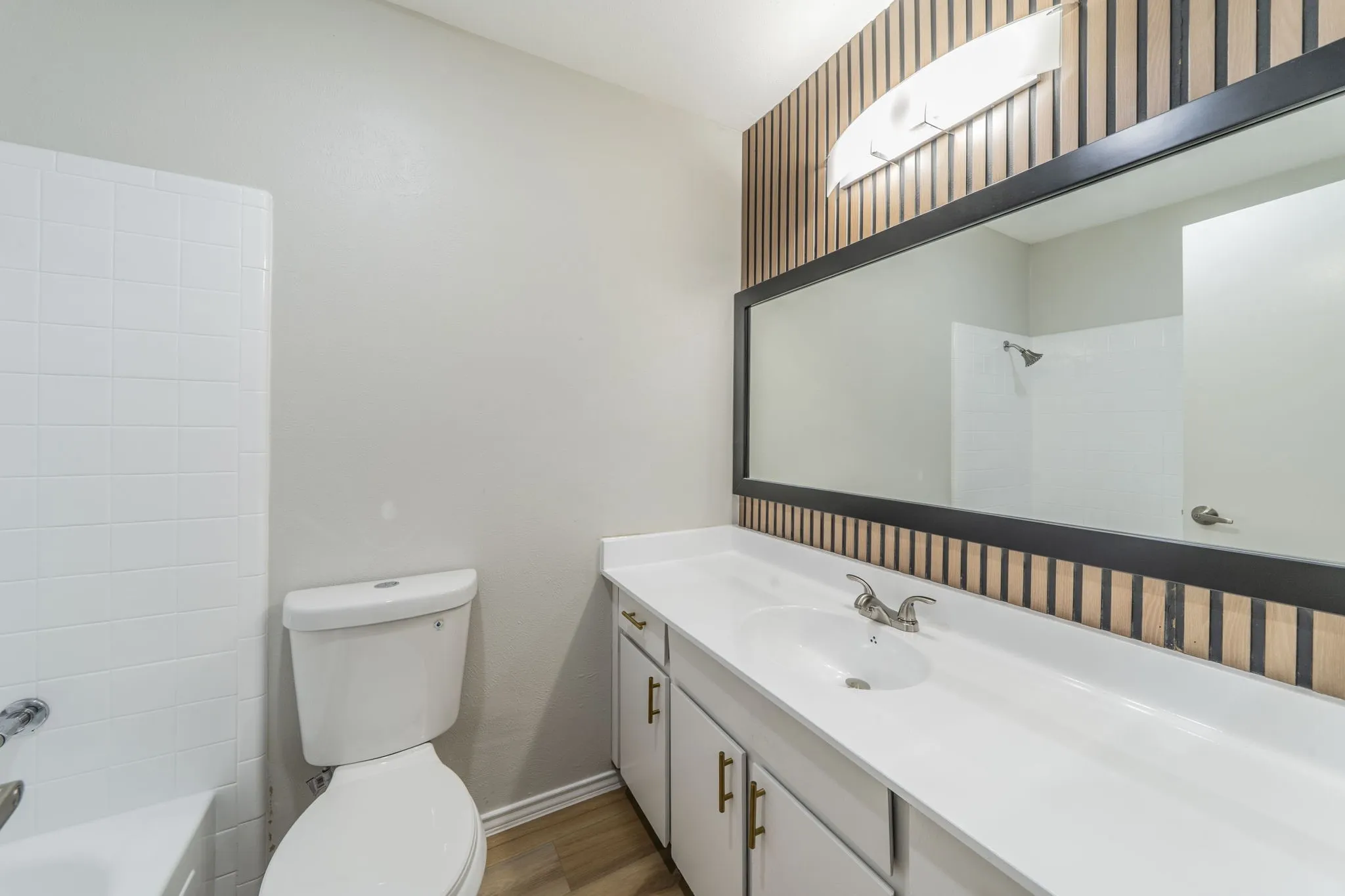 White tile tub and shower combination