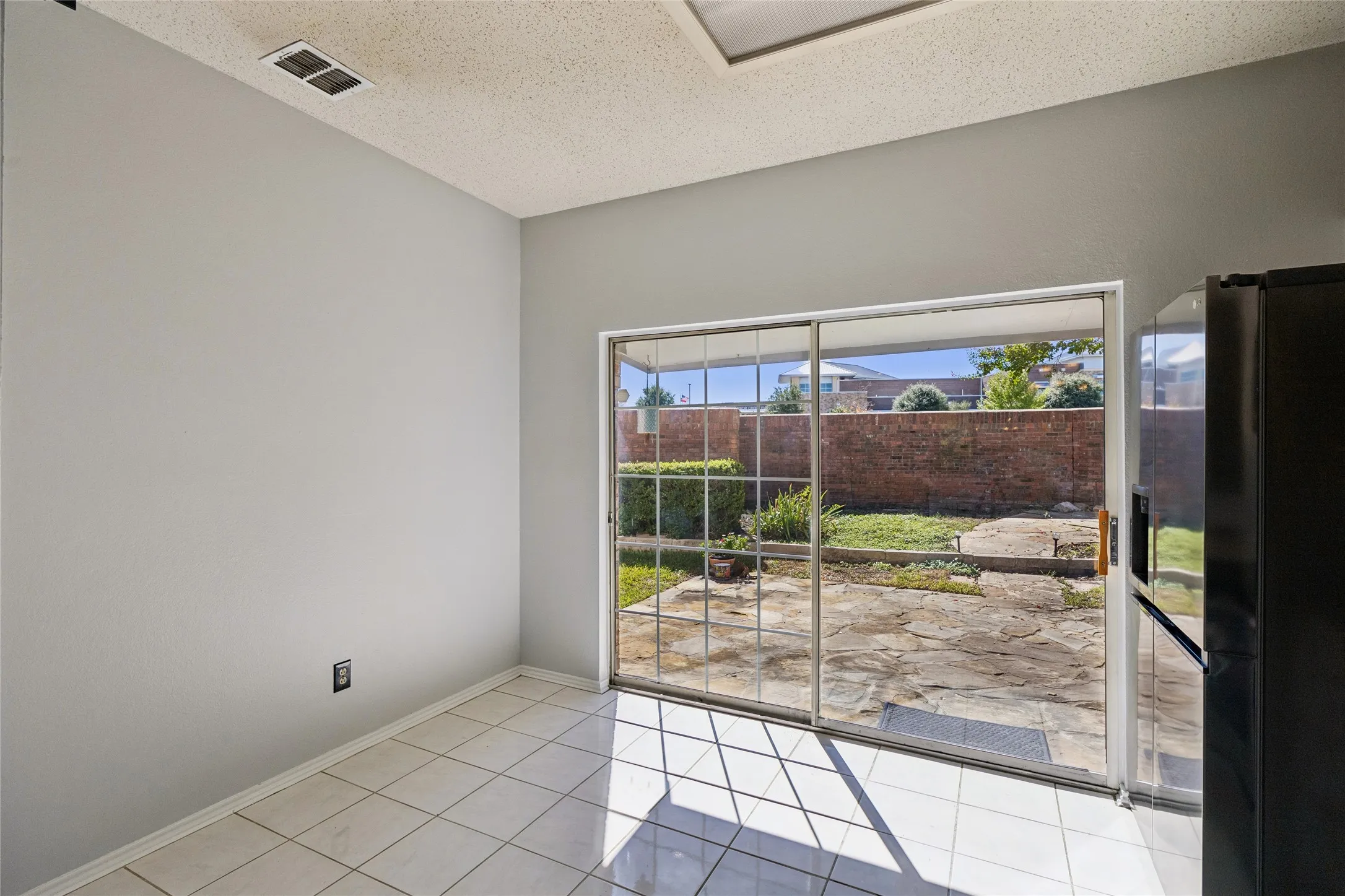 Abundant natural light floods the kitchen.