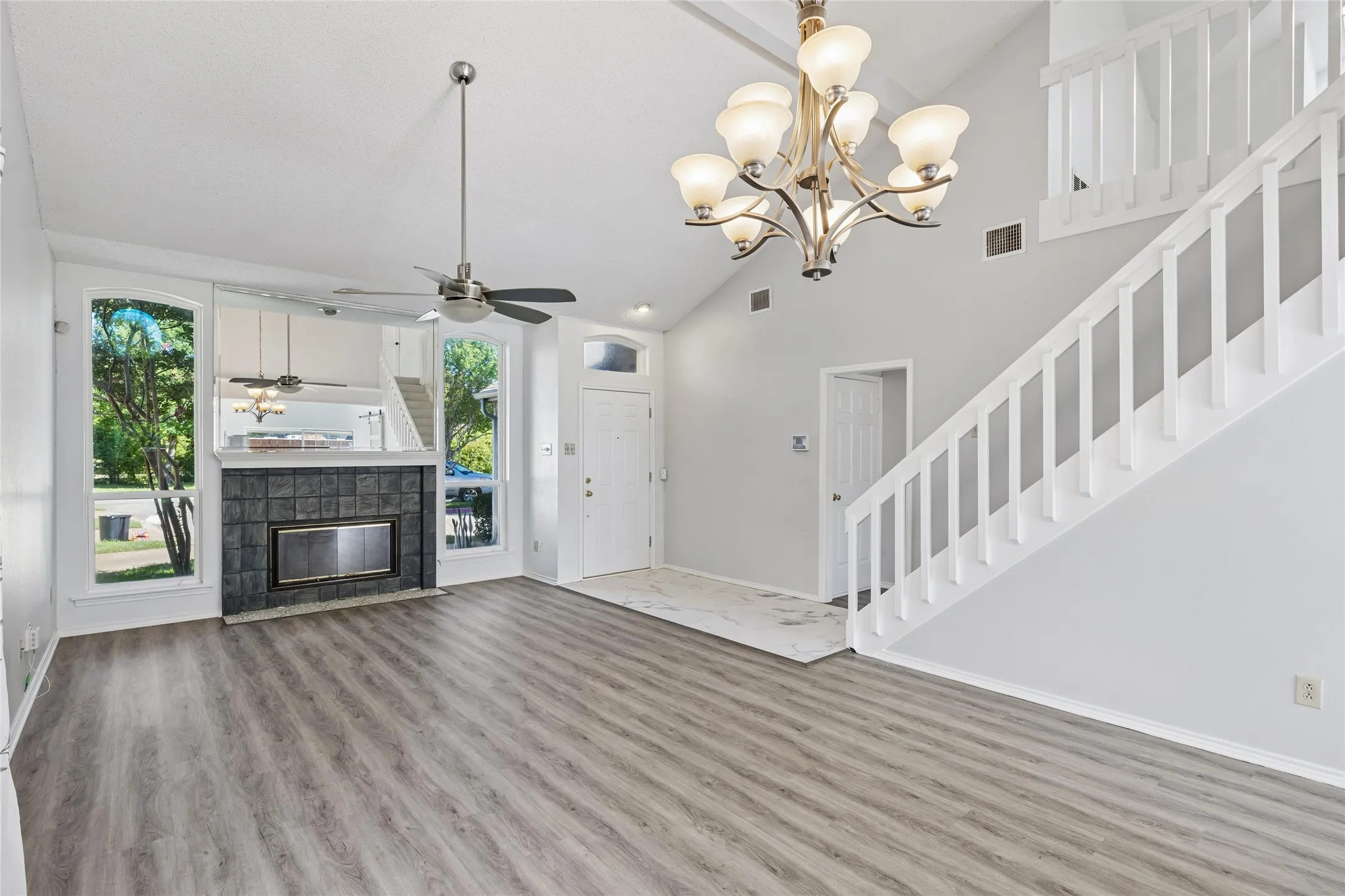 A wood burning fireplace is the focal point for gatherings.
