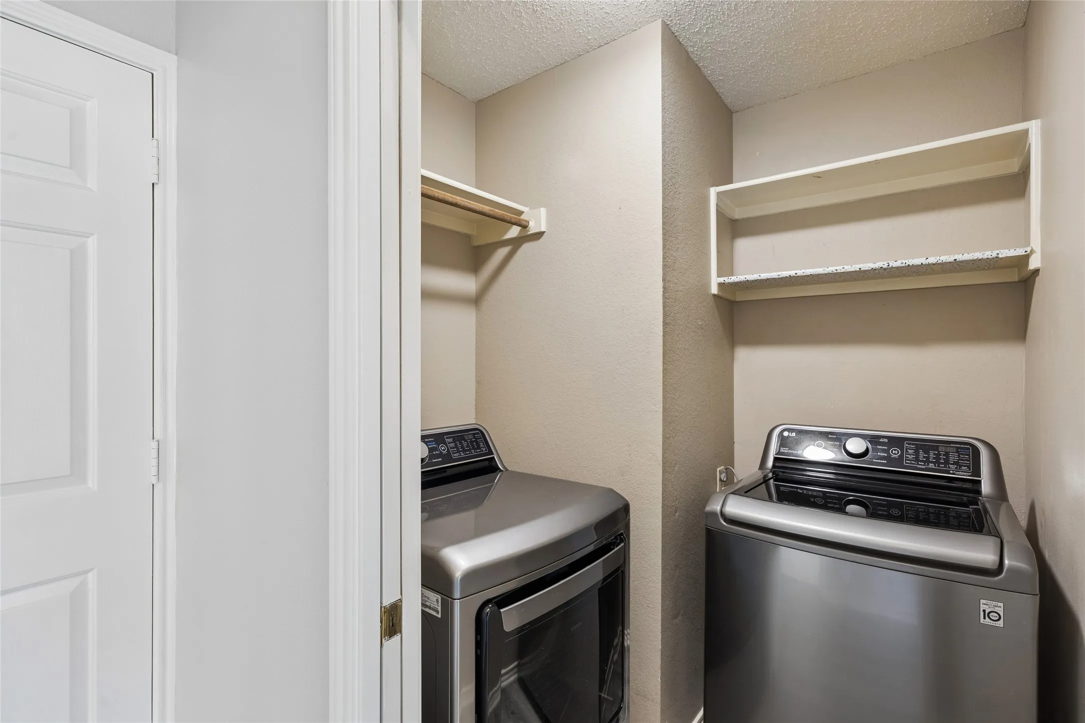 The laundry room is conveniently located near the primary bedroom.