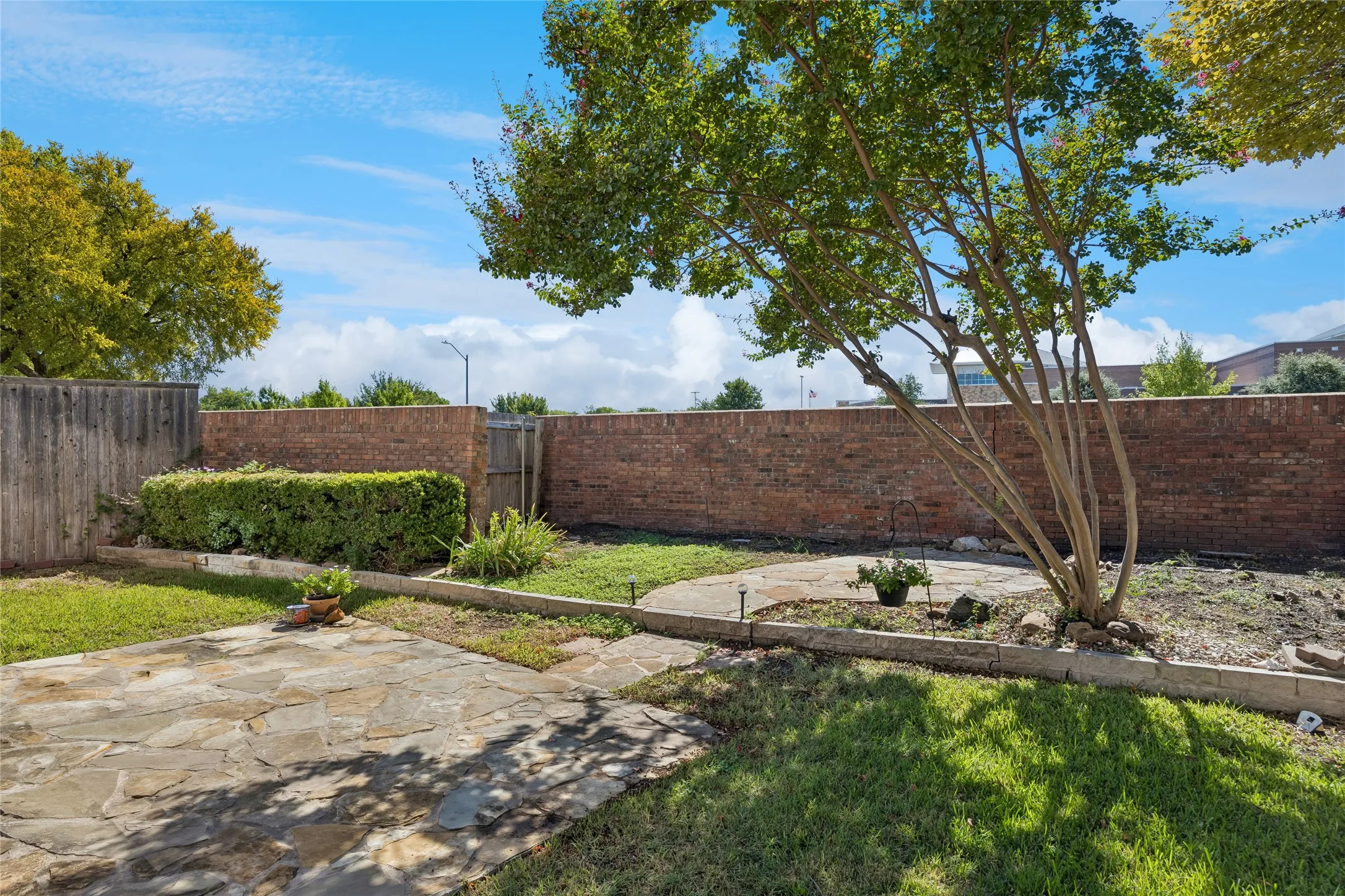 The welcoming backyard offers 2 entertaining areas.