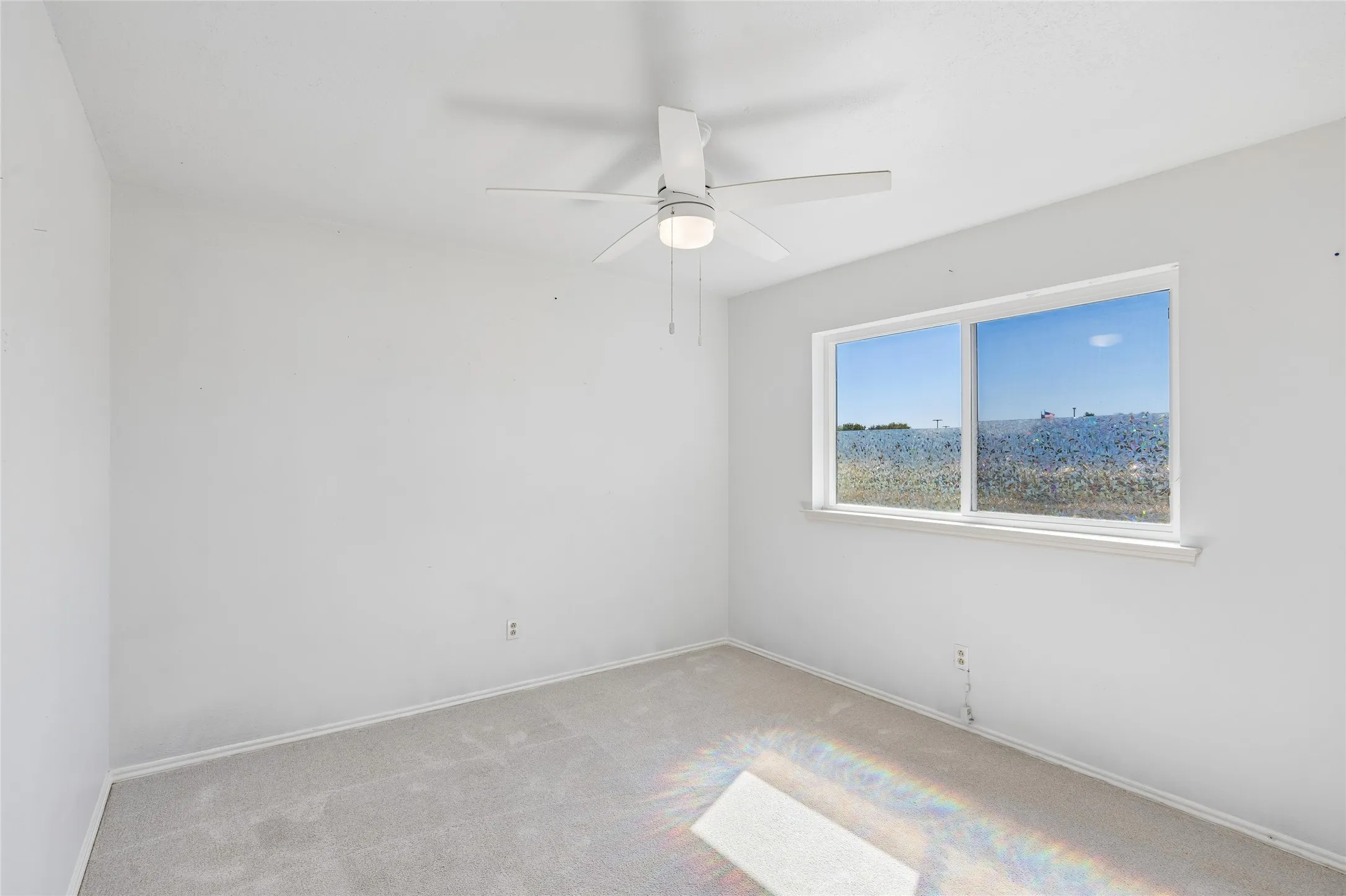 Bedroom 3 also offers abundant natural light and closet.