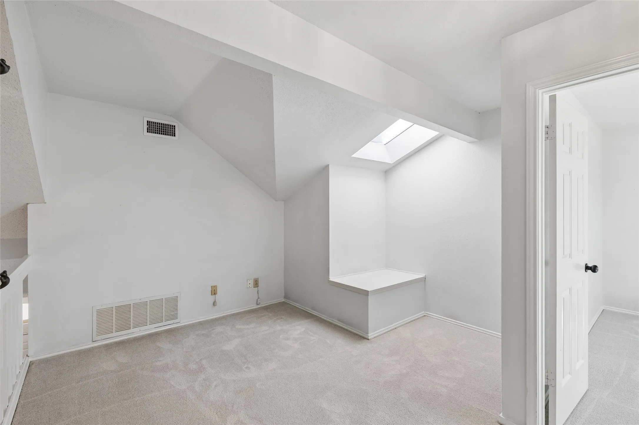Versatile loft is perfect for a reading nook, home office or quiet retreat.