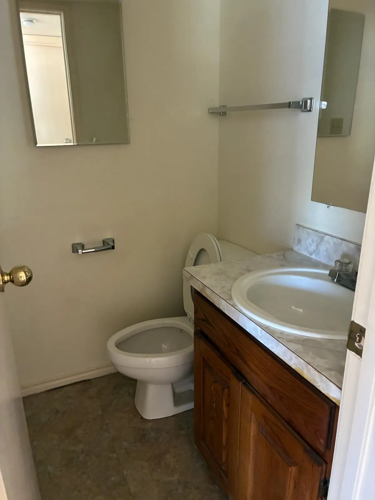 Bathroom with vanity and toilet