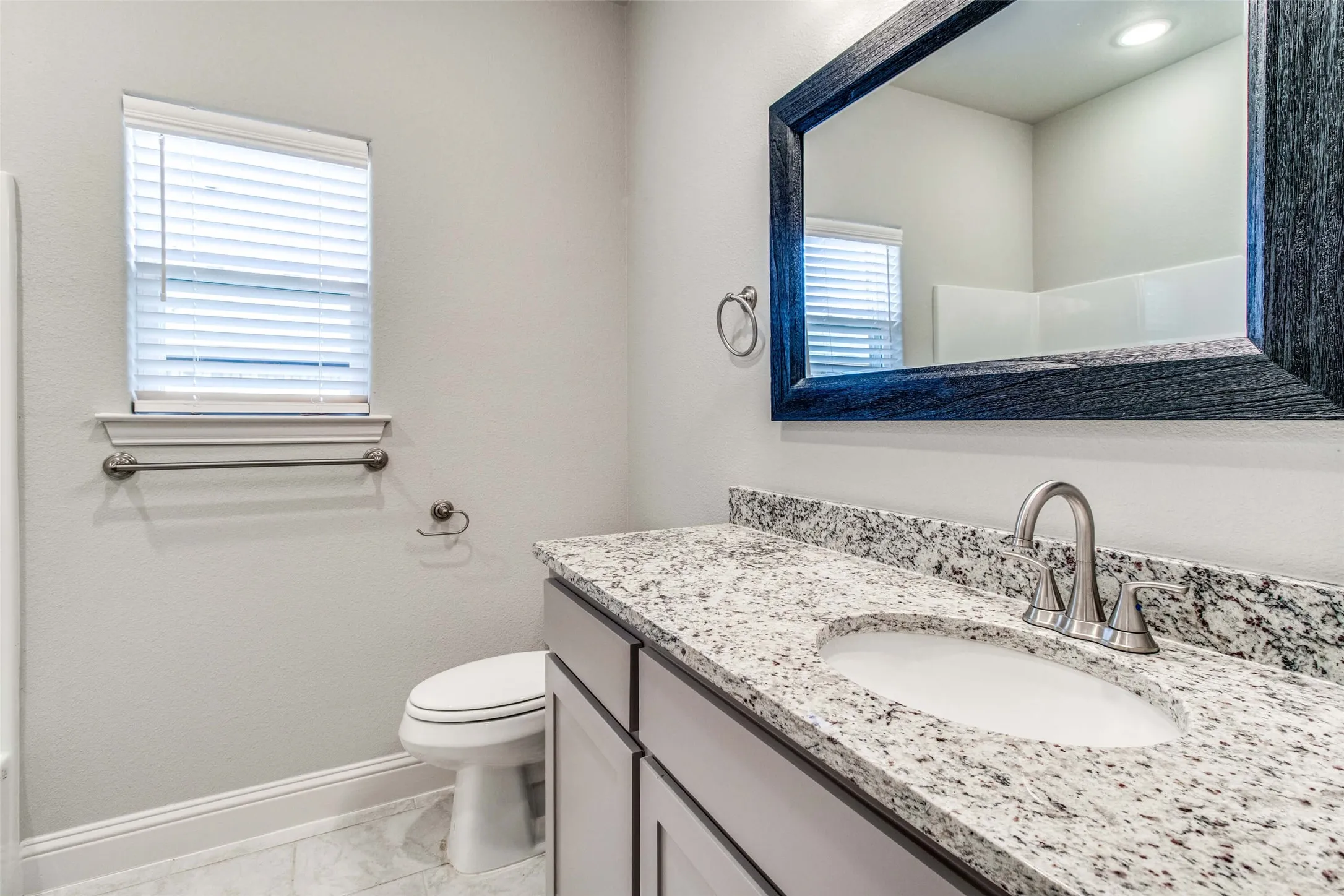 Granite vanity countertop with an undermount sink