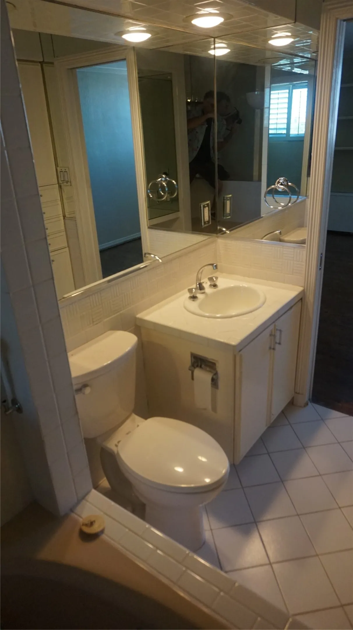 Vanity with a built-in sink and storage cabinet