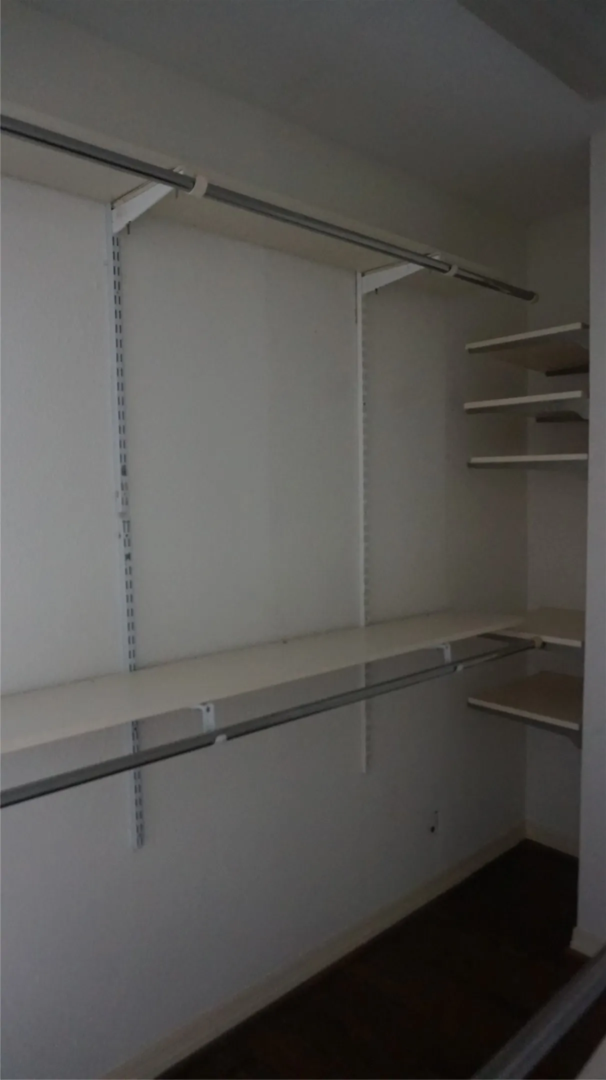 Customizable closet system with adjustable shelving and hanging rods